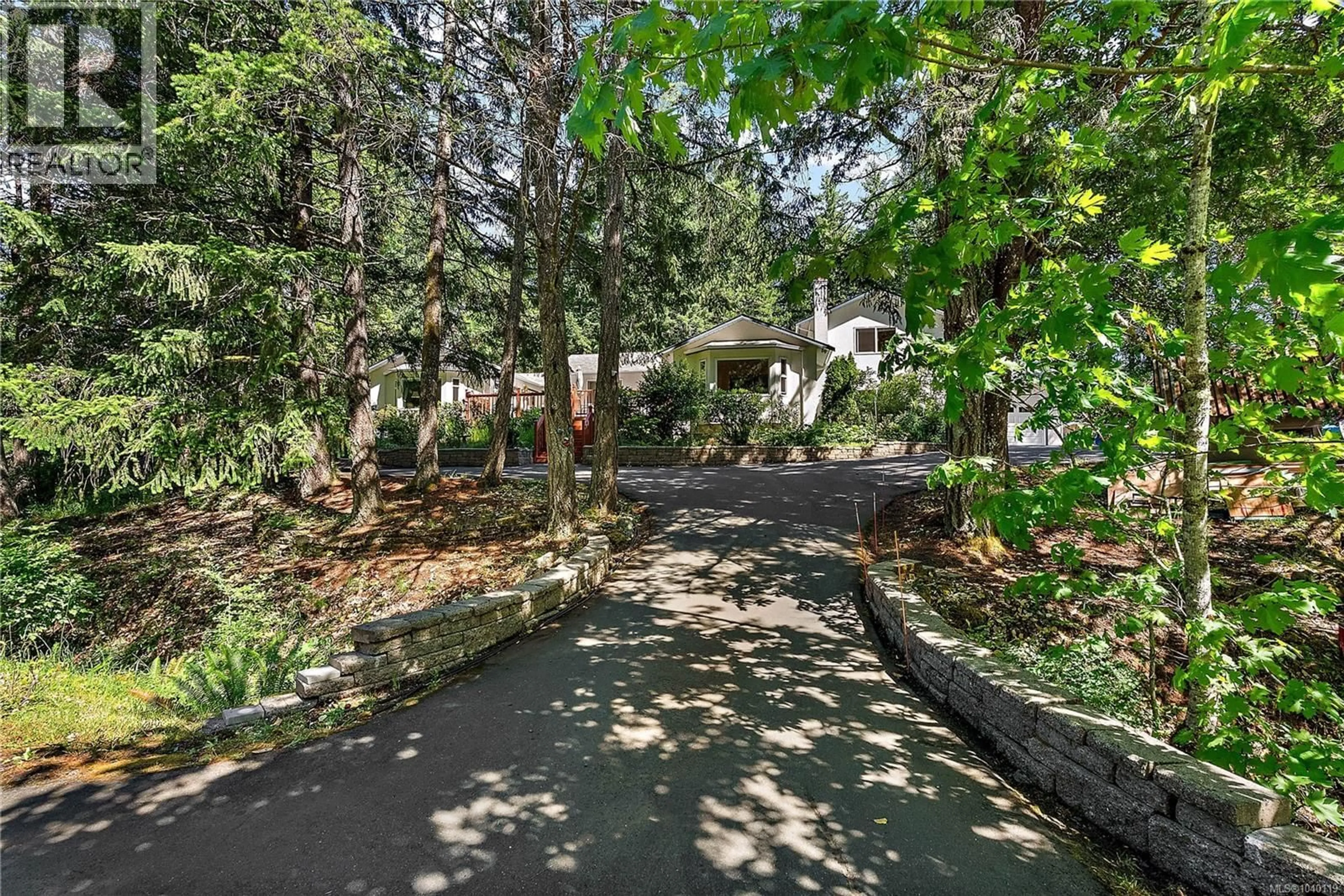 A pic from outside/outdoor area/front of a property/back of a property/a pic from drone, street for 816 FINLAYSON ARM ROAD, Highlands British Columbia V9B6E5