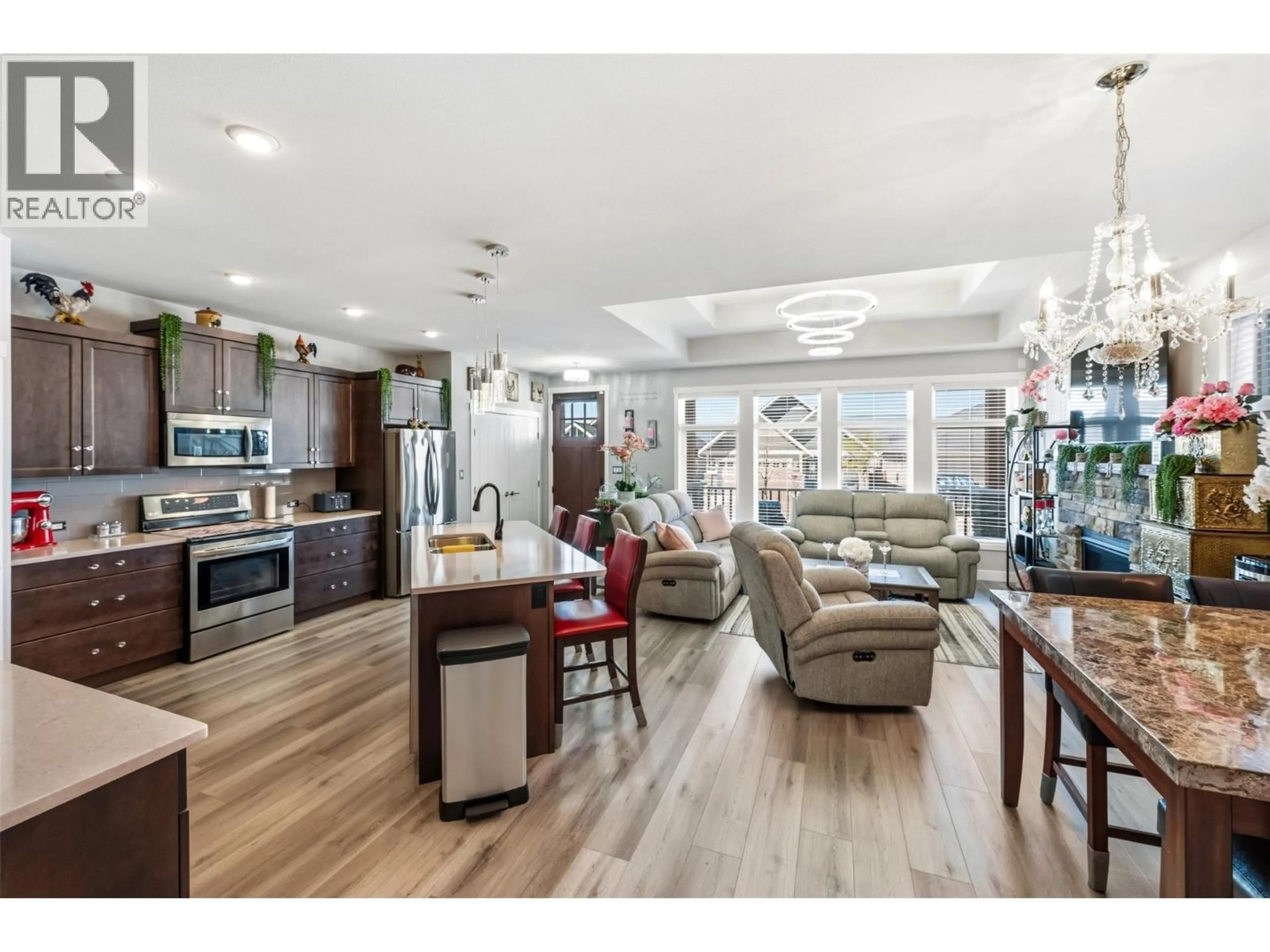 Open concept kitchen, wood/laminate floor for 962 HOLDEN ROAD, Penticton British Columbia V2A9G4