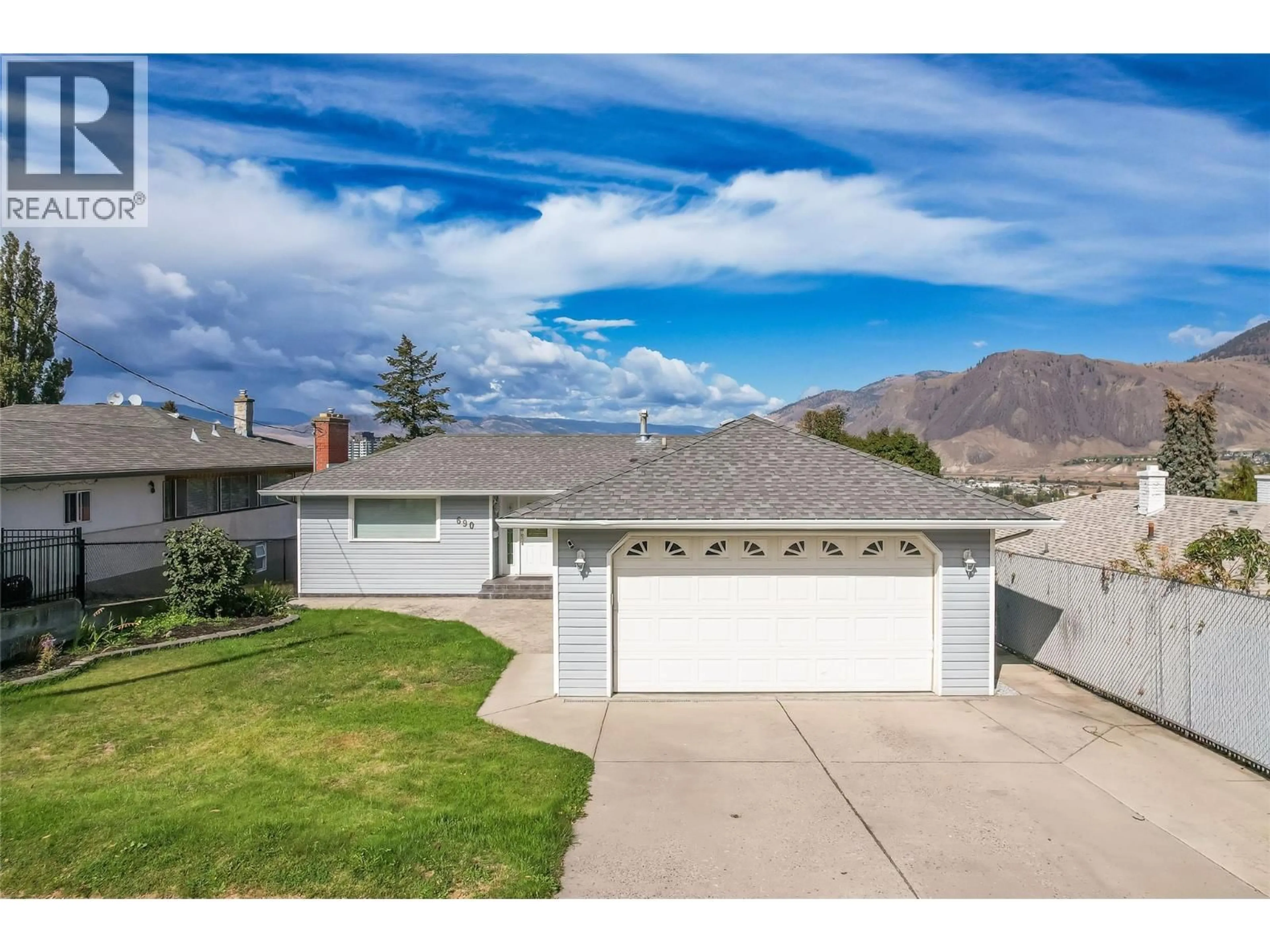 A pic from outside/outdoor area/front of a property/back of a property/a pic from drone, mountain view for 690 FRASER STREET, Kamloops British Columbia V2C3H2