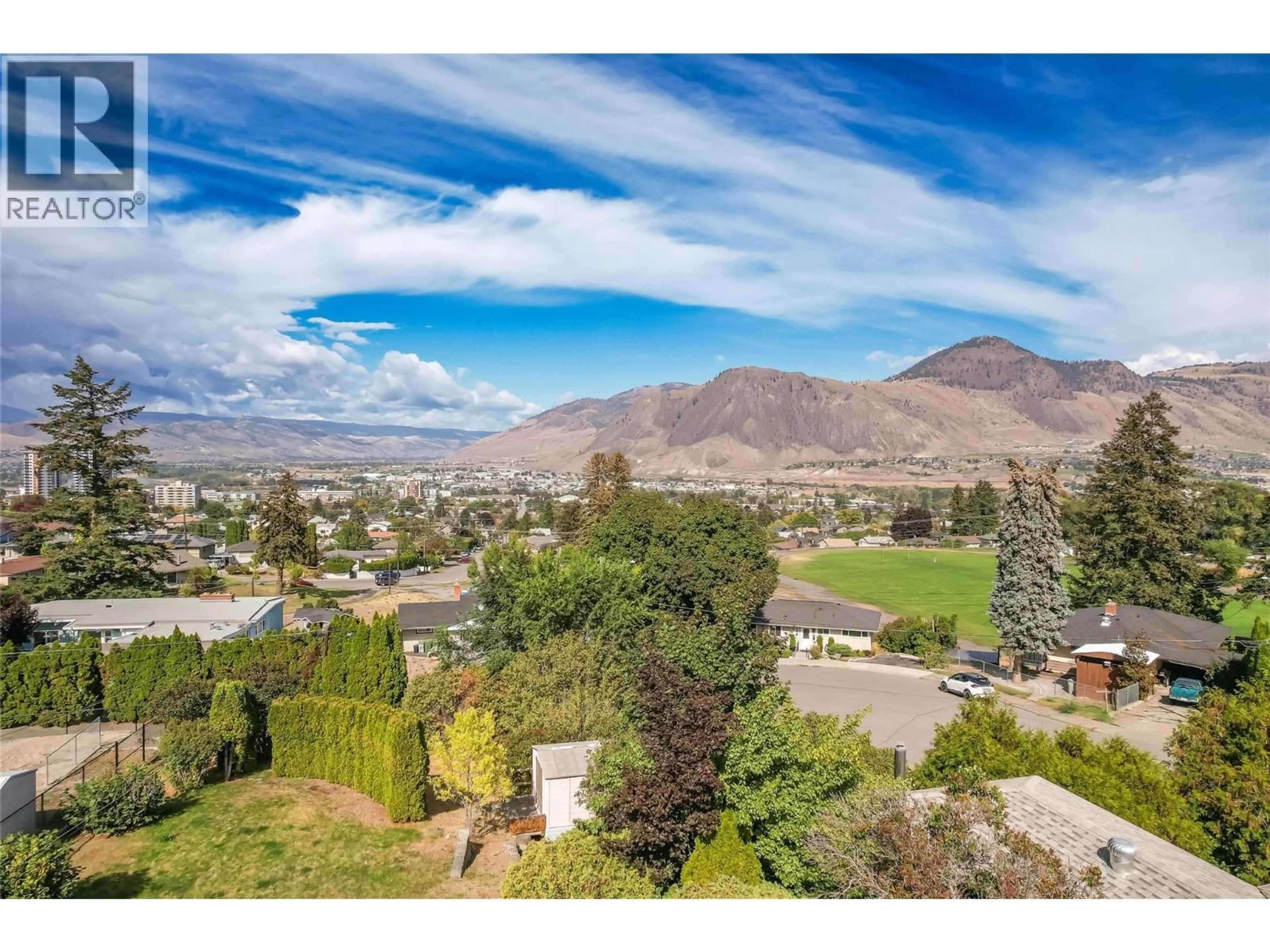 A pic from outside/outdoor area/front of a property/back of a property/a pic from drone, mountain view for 690 FRASER STREET, Kamloops British Columbia V2C3H2
