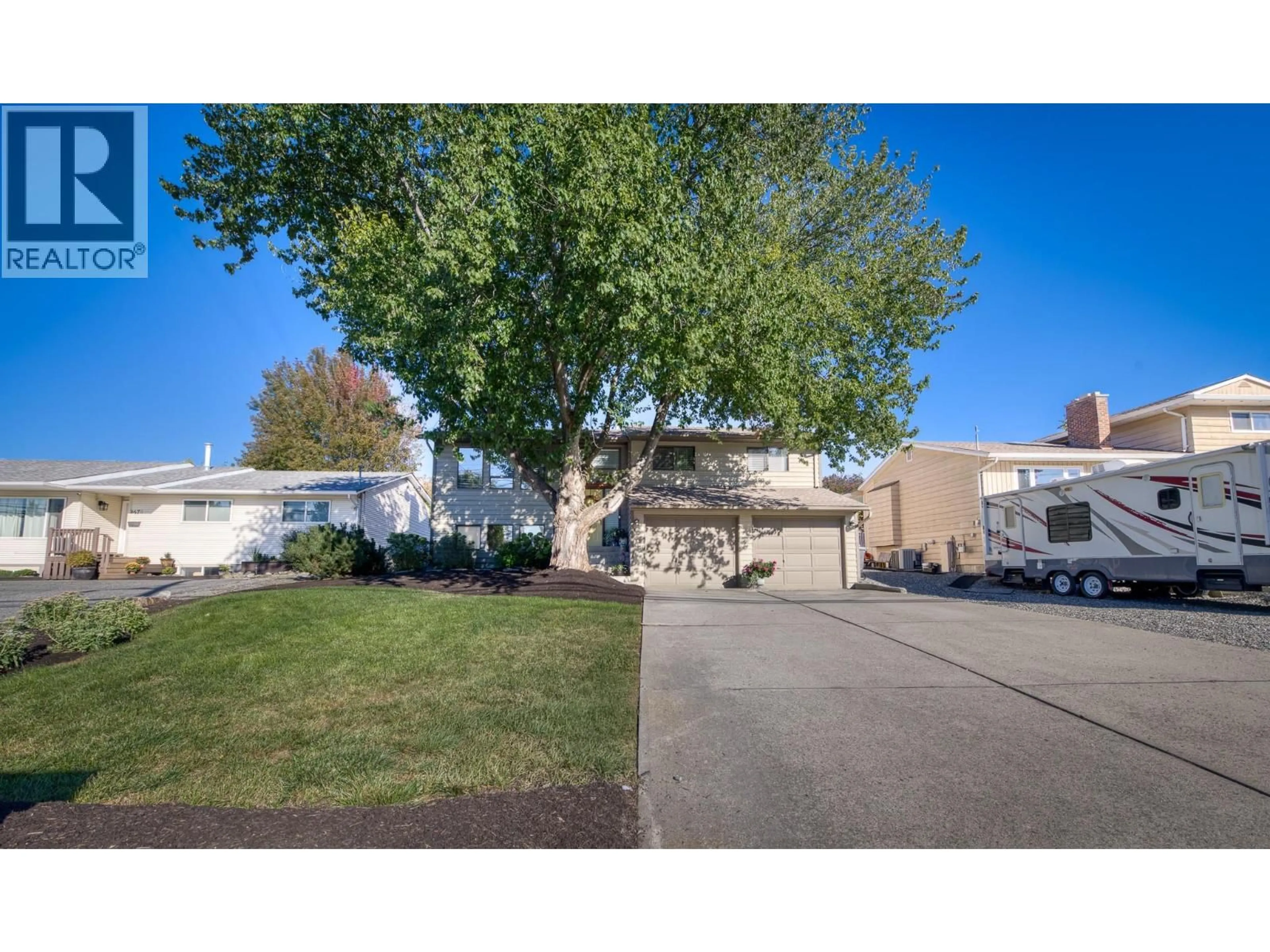 A pic from outside/outdoor area/front of a property/back of a property/a pic from drone, street for 4477 GORDON DRIVE, Kelowna British Columbia V1W1T2