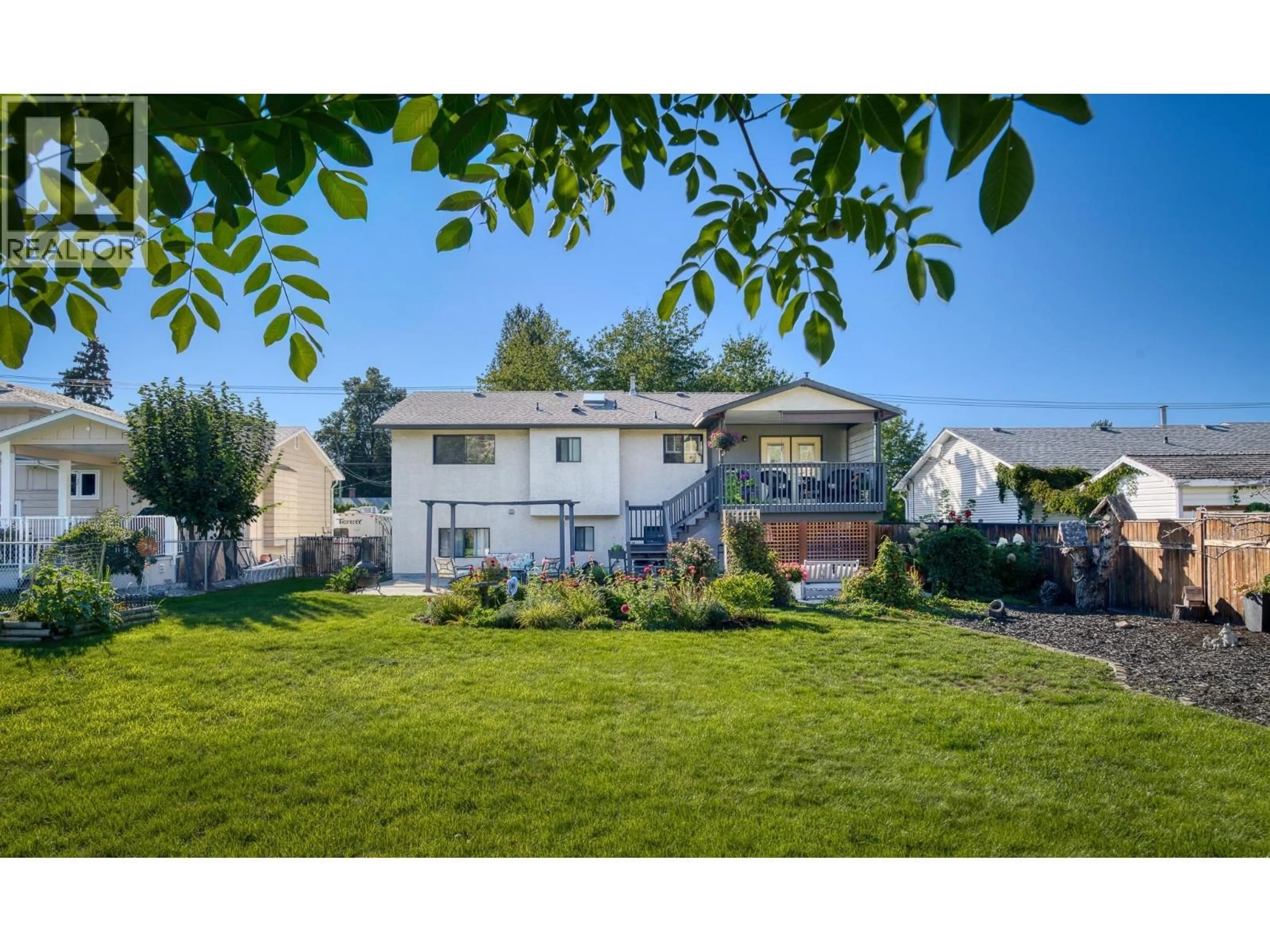 A pic from outside/outdoor area/front of a property/back of a property/a pic from drone, street for 4477 GORDON DRIVE, Kelowna British Columbia V1W1T2