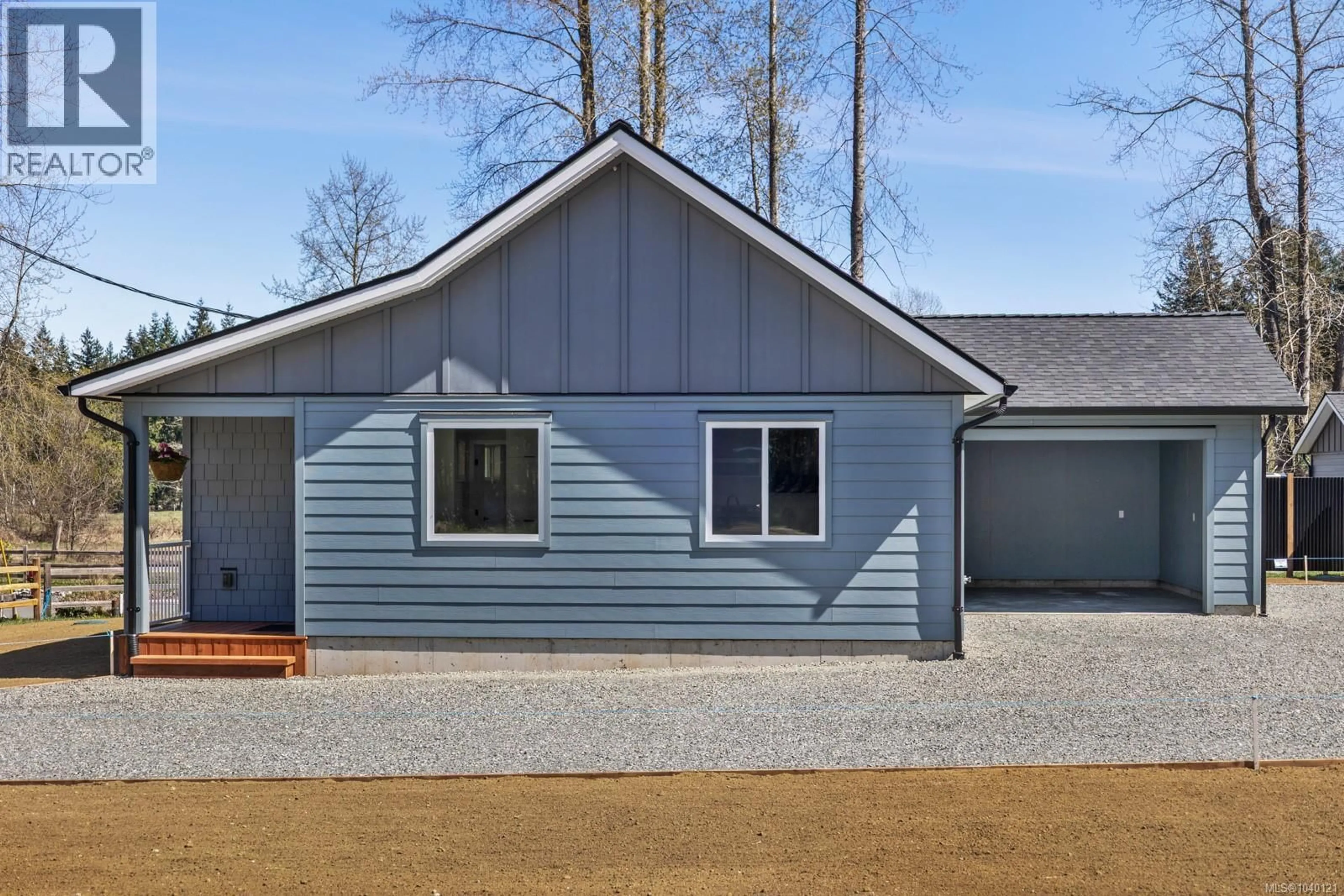 Home with vinyl exterior material, street for 1963 WILFRED ROAD, Black Creek British Columbia V9J1J8