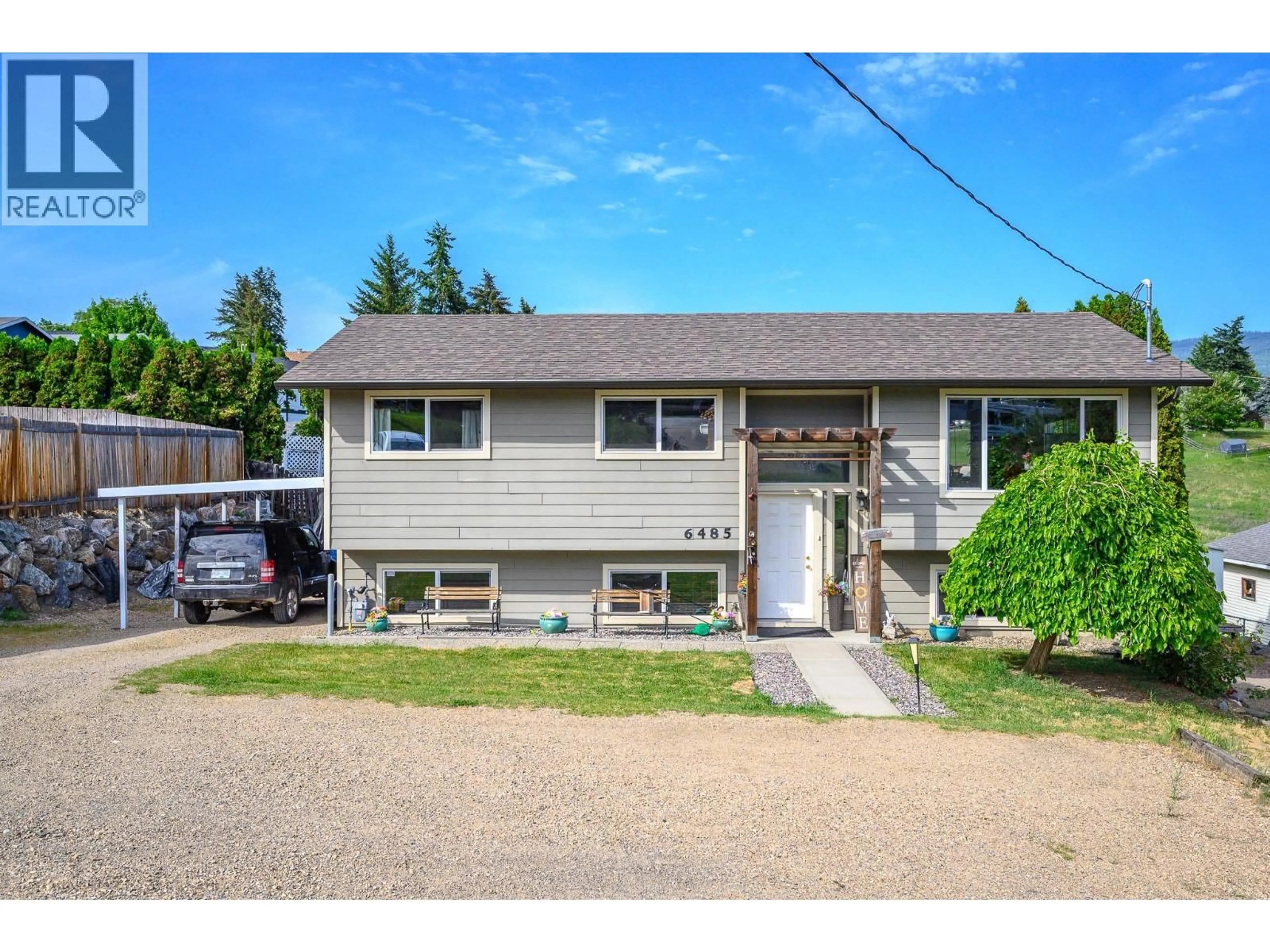 Home with vinyl exterior material, street for 6485 CARDINAL ROAD, Vernon British Columbia V1H1W3