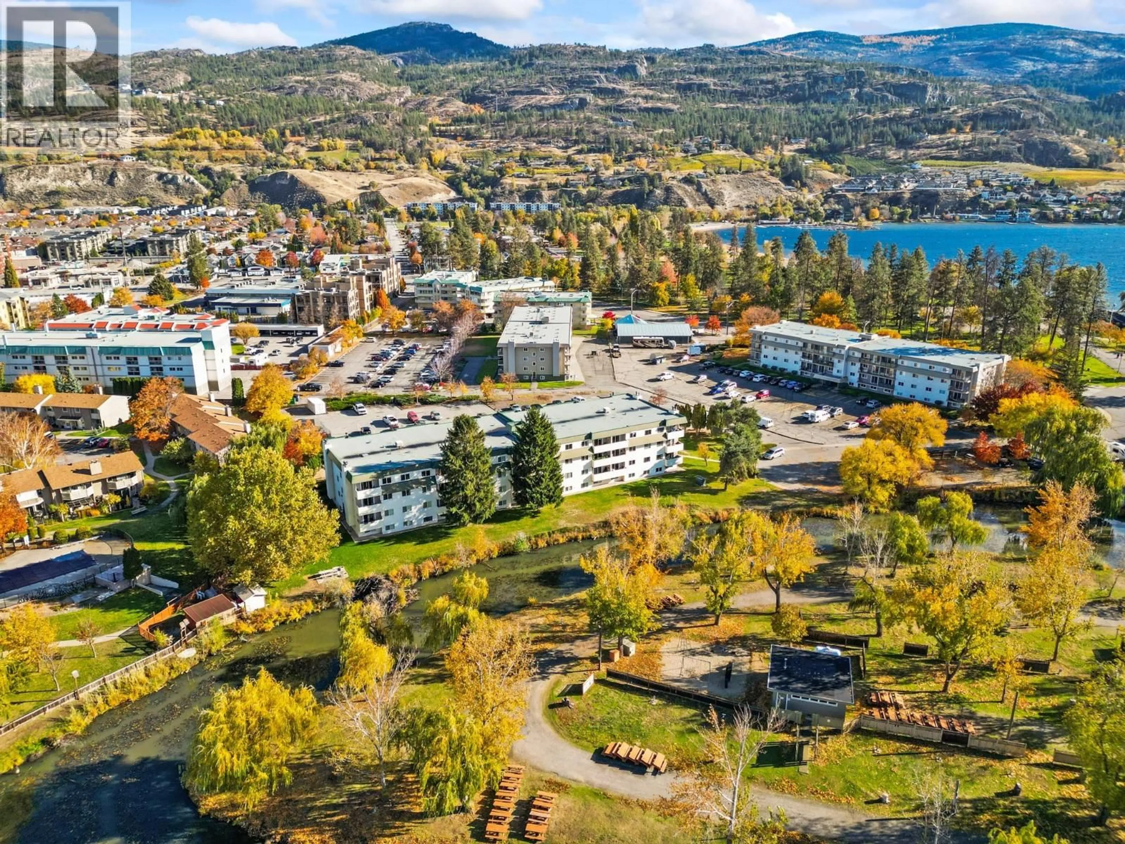 A pic from outside/outdoor area/front of a property/back of a property/a pic from drone, mountain view for 408 - 150 SKAHA PLACE, Penticton British Columbia V2A7K1