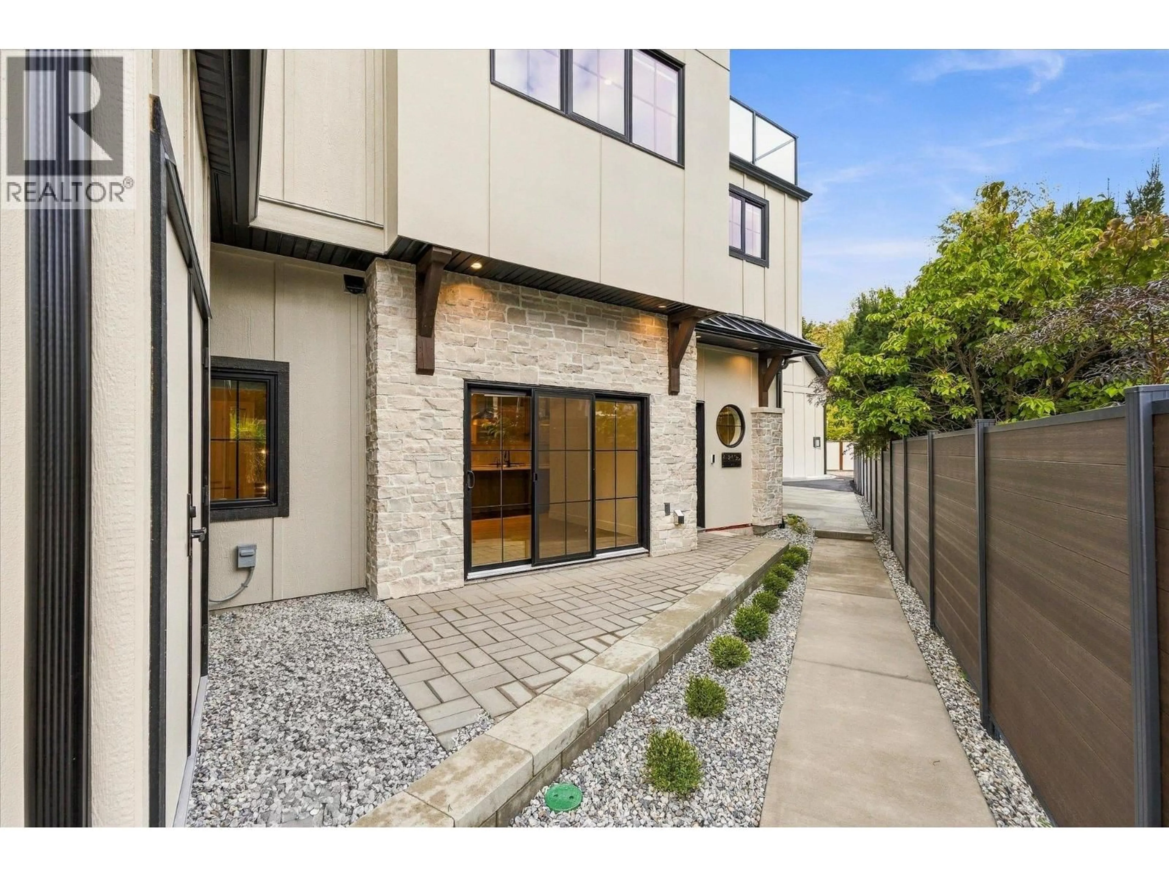 Home with brick exterior material, street for 4 - 2435 TAYLOR CRESCENT, Kelowna British Columbia V1Y1L9