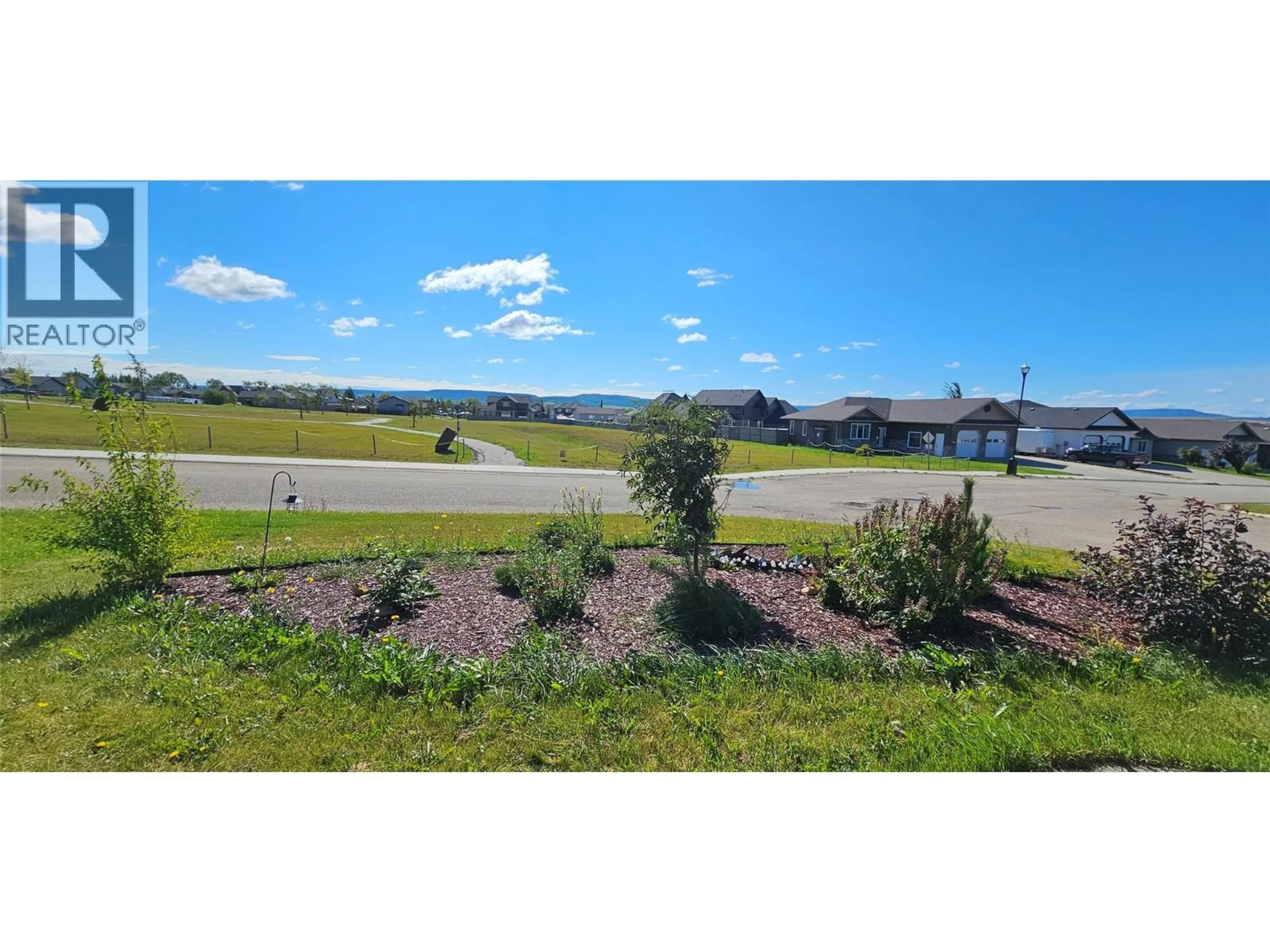 A pic from outside/outdoor area/front of a property/back of a property/a pic from drone, mountain view for 8416 18A STREET, Dawson Creek British Columbia V1G0E2