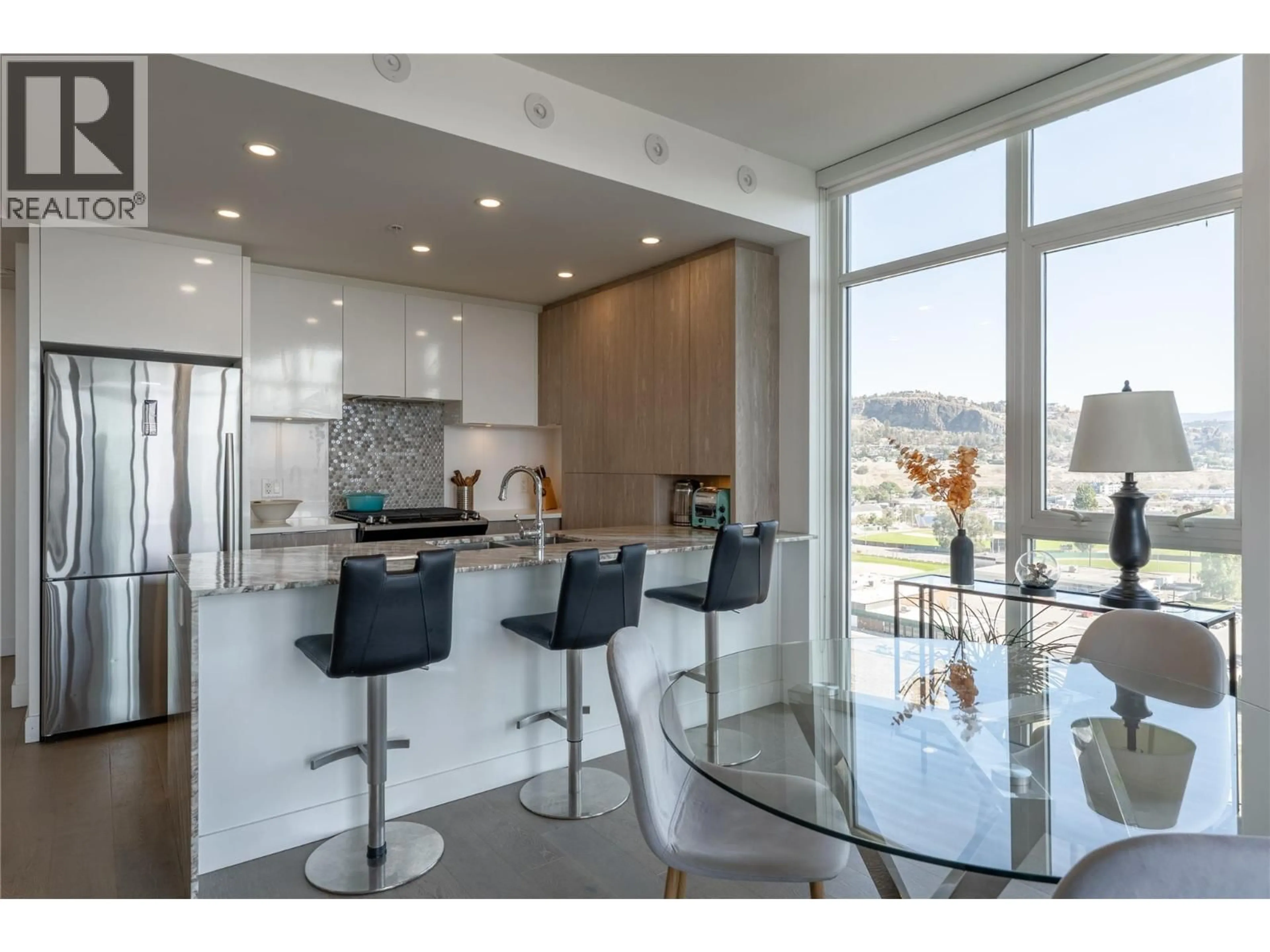 Open concept kitchen, ceramic/tile floor for 1305 - 1151 SUNSET DRIVE, Kelowna British Columbia V1Y9Z5