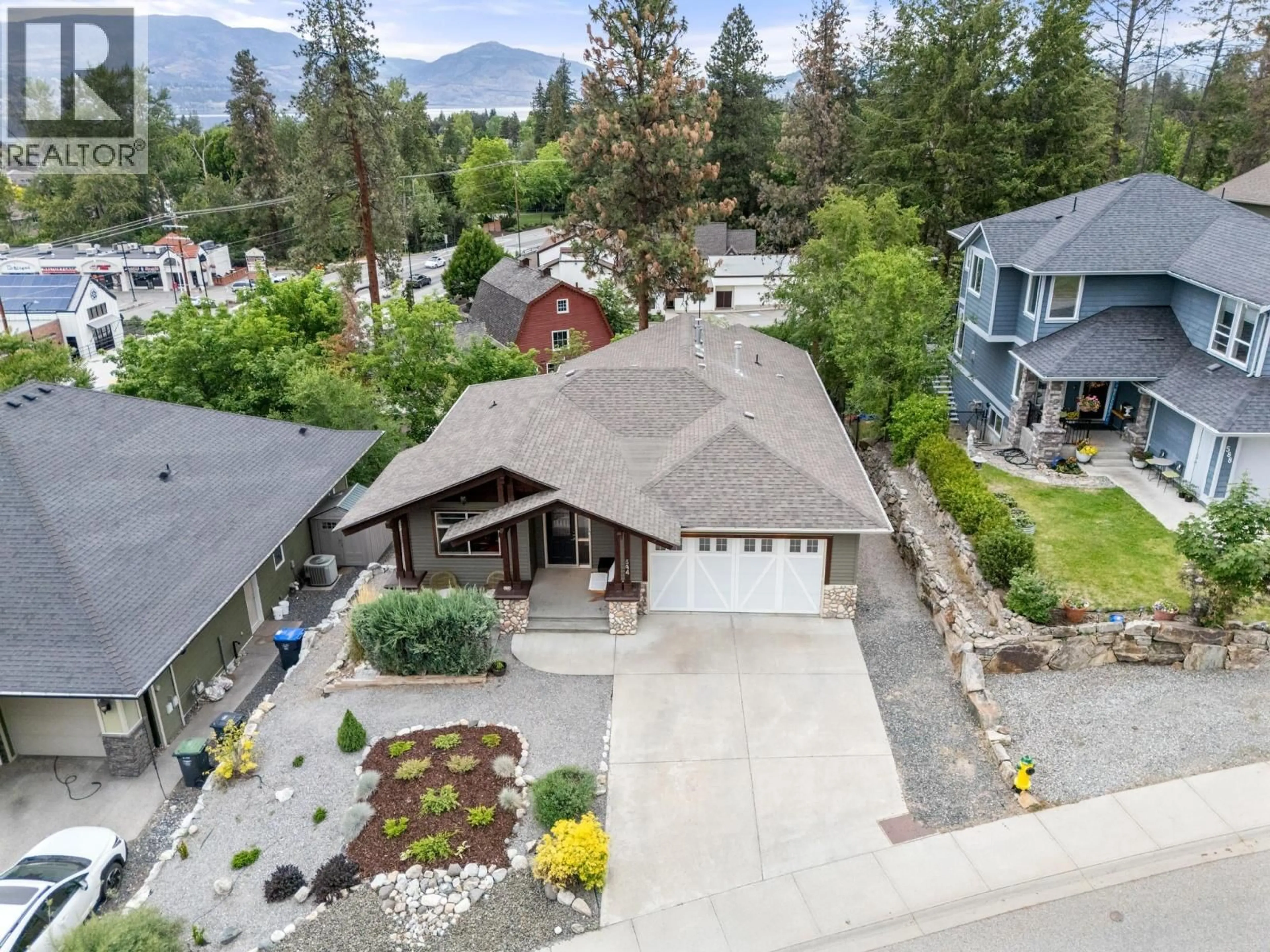 A pic from outside/outdoor area/front of a property/back of a property/a pic from drone, mountain view for 594 VINTAGE TERRACE ROAD, Kelowna British Columbia V1W3B3