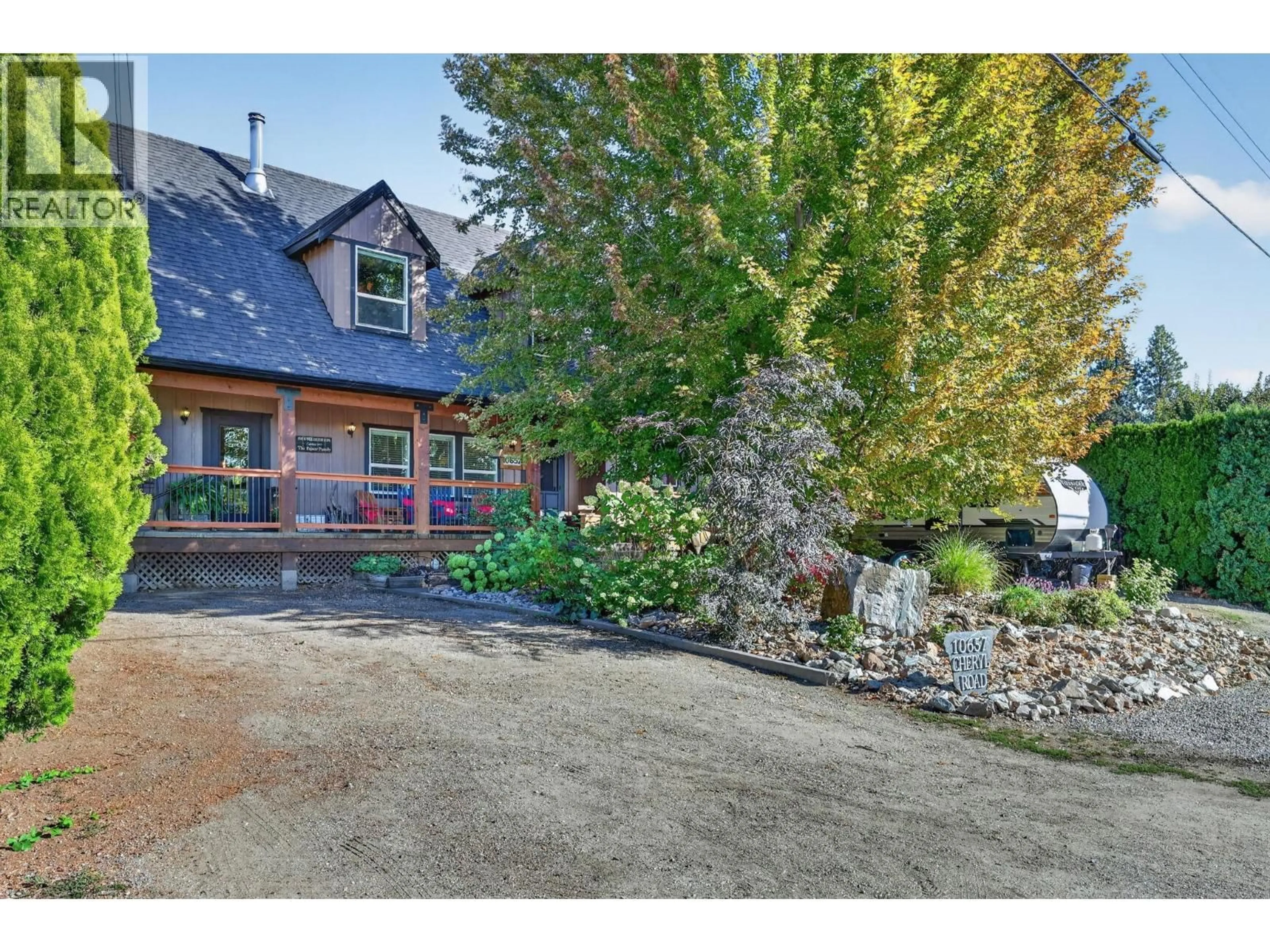 A pic from outside/outdoor area/front of a property/back of a property/a pic from drone, street for 10657 CHERYL ROAD, Lake Country British Columbia V4V1W3