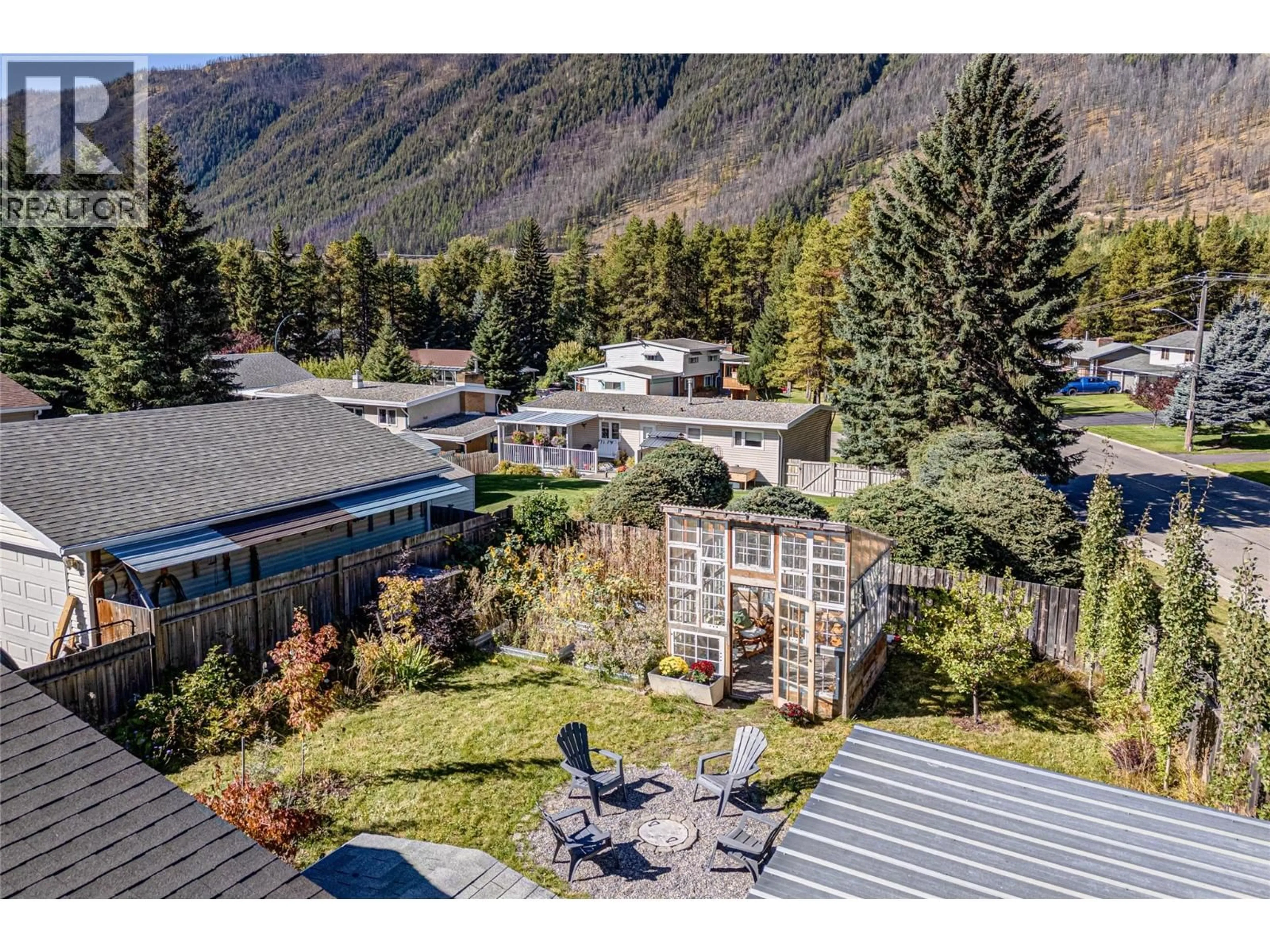 A pic from outside/outdoor area/front of a property/back of a property/a pic from drone, mountain view for 231 BLUE SPRUCE CRESCENT, Sparwood British Columbia V0B2G0
