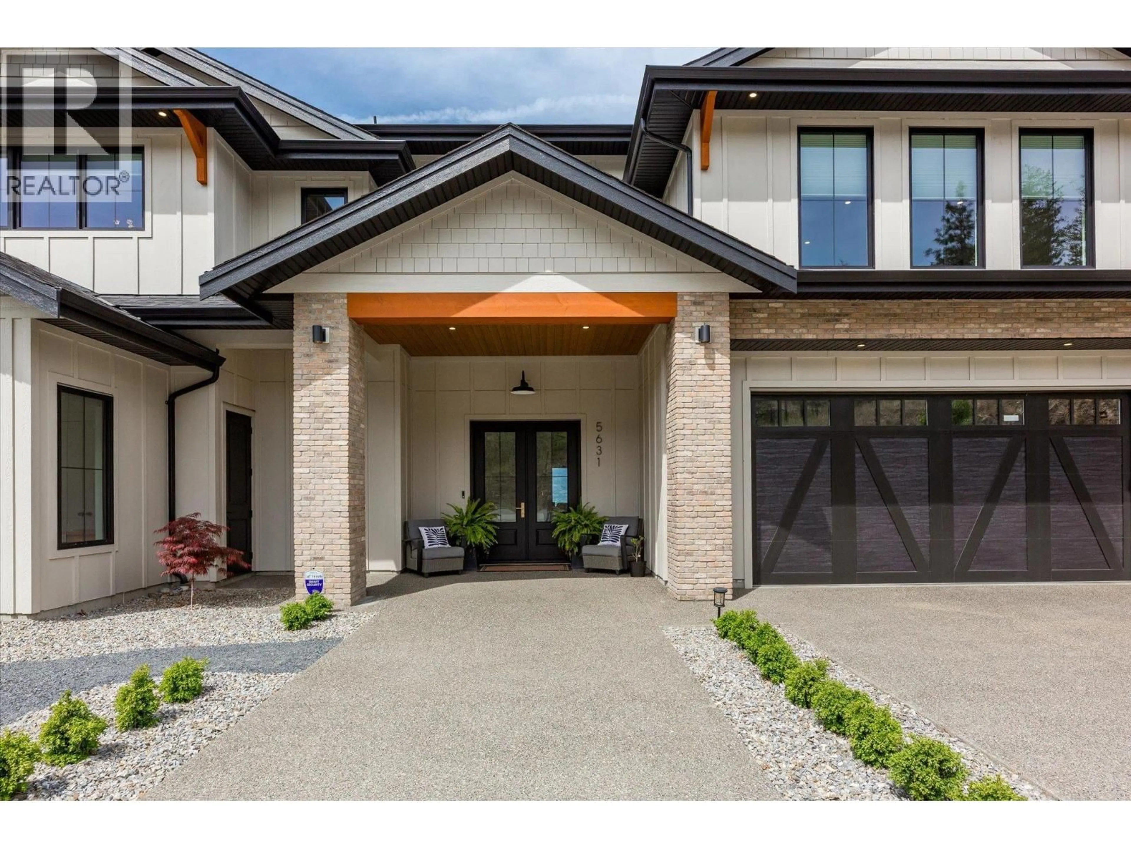 Home with brick exterior material, street for 5631 UPPER MISSION COURT, Kelowna British Columbia V1W0C5
