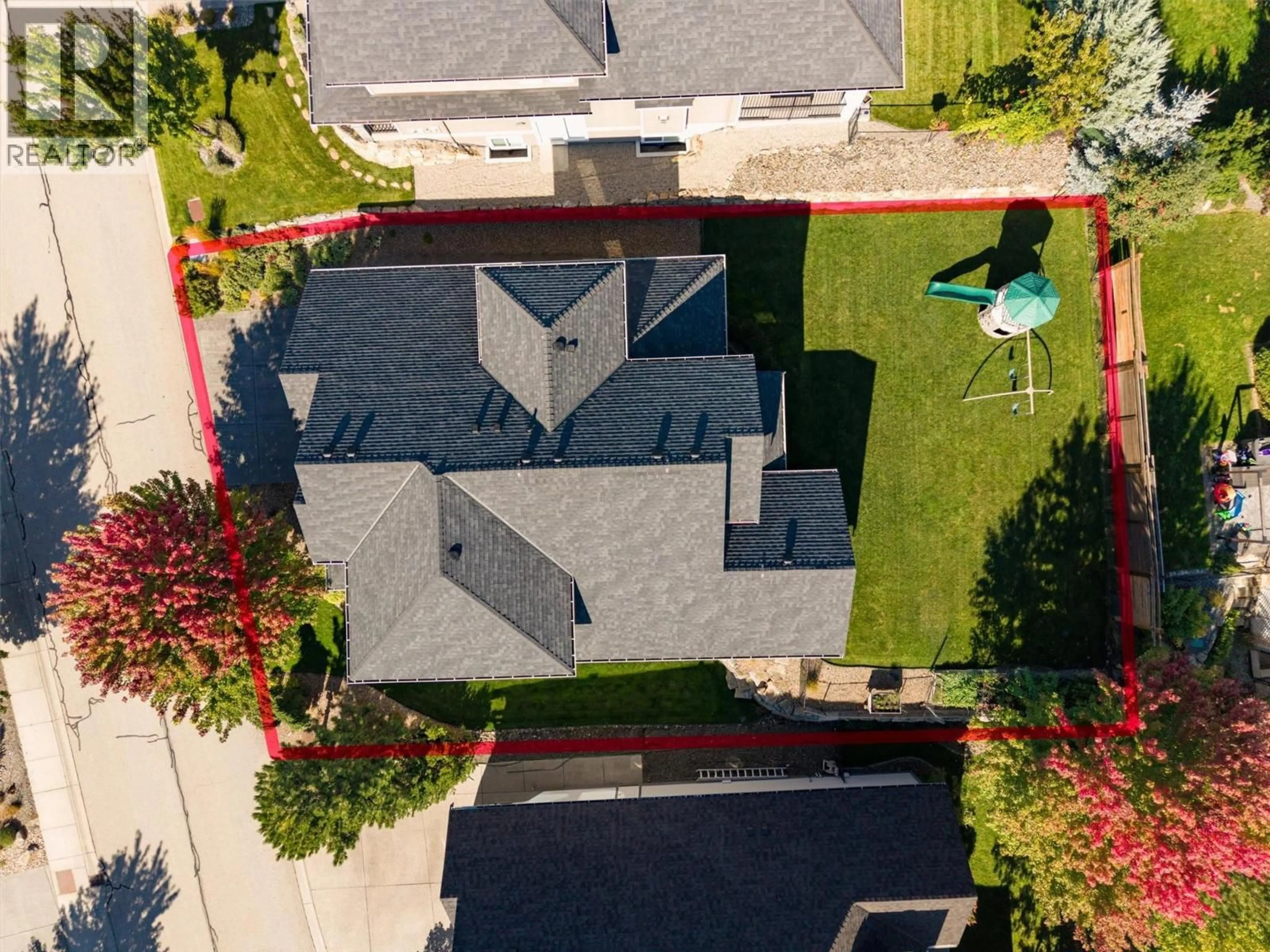 A pic from outside/outdoor area/front of a property/back of a property/a pic from drone, street for 155 SKYLAND DRIVE, Kelowna British Columbia V1V3A1