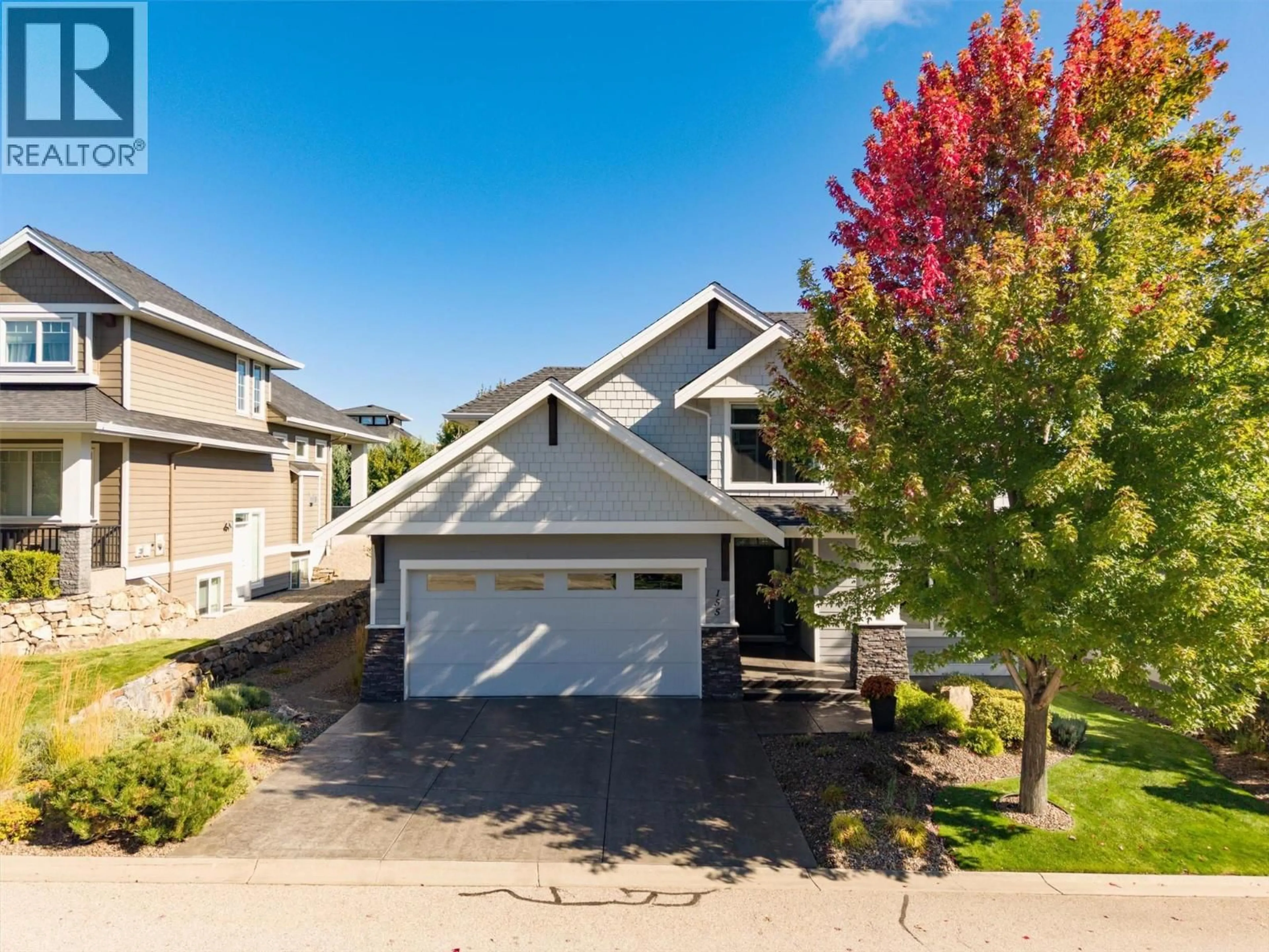 Home with vinyl exterior material, street for 155 SKYLAND DRIVE, Kelowna British Columbia V1V3A1