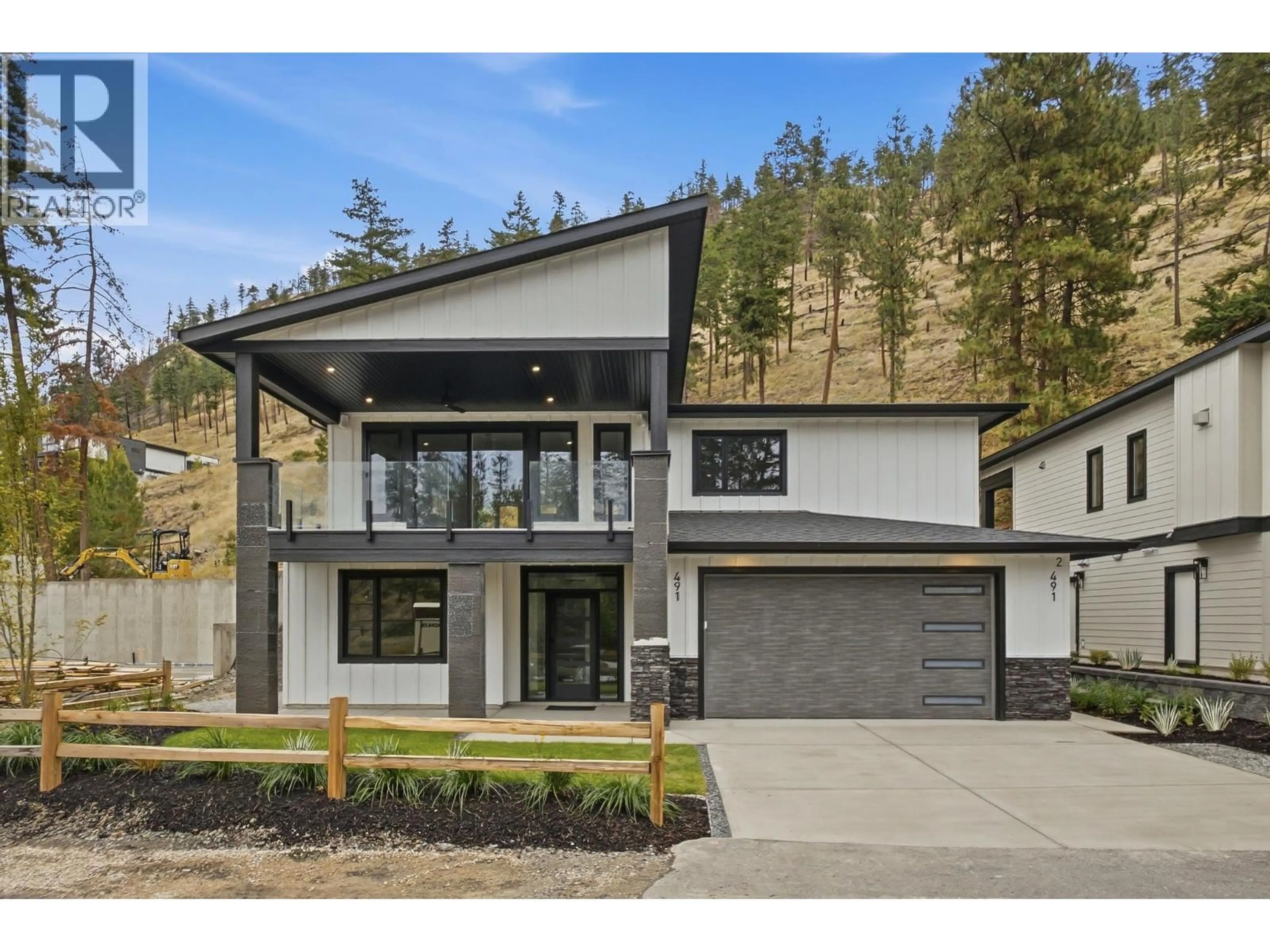Home with vinyl exterior material, mountain view for 491 CLIFTON ROAD NORTH, Kelowna British Columbia V1V1H1