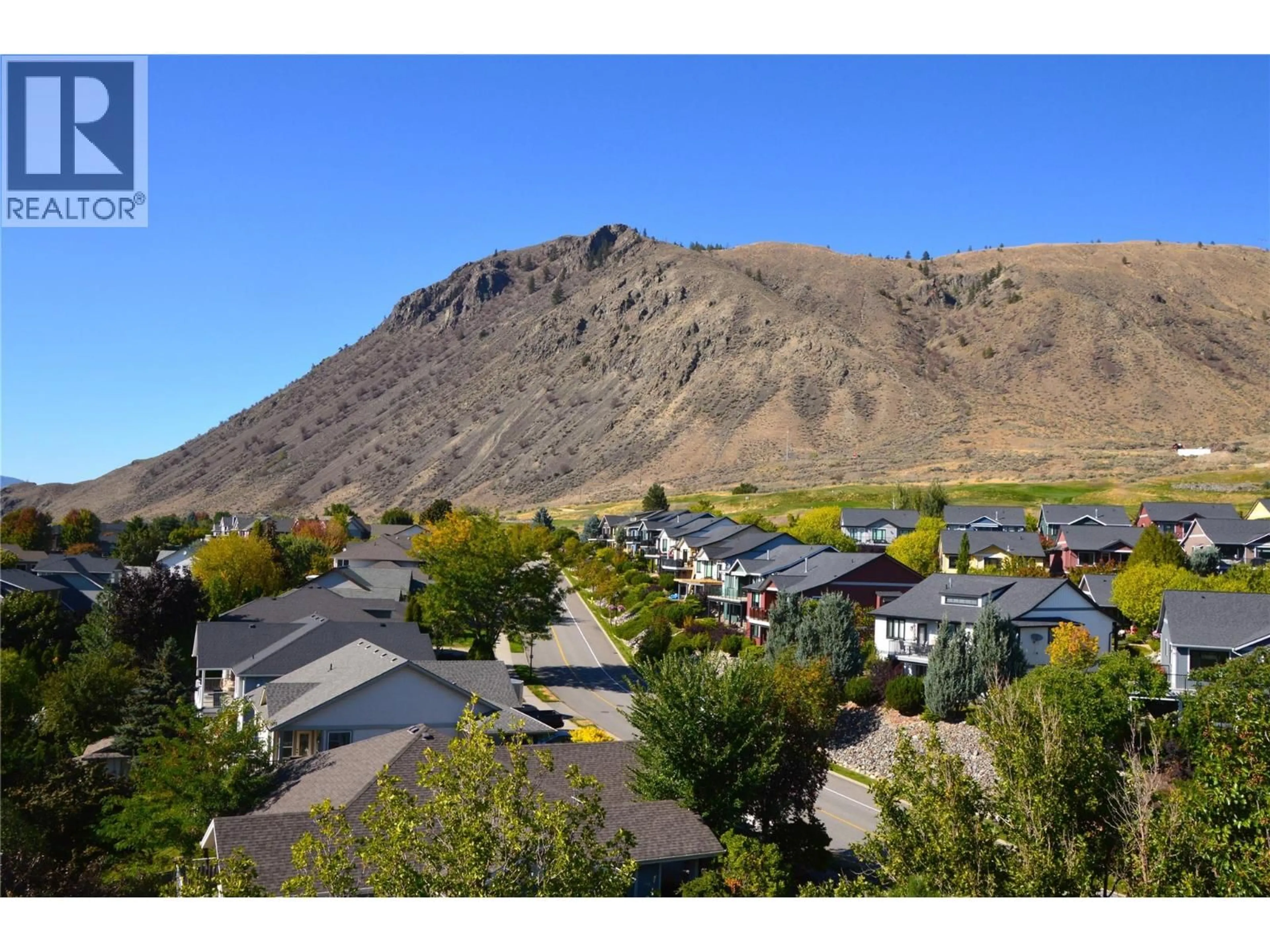 A pic from outside/outdoor area/front of a property/back of a property/a pic from drone, mountain view for 1403-1000 TALASA WAY, Kamloops British Columbia V2H0C2