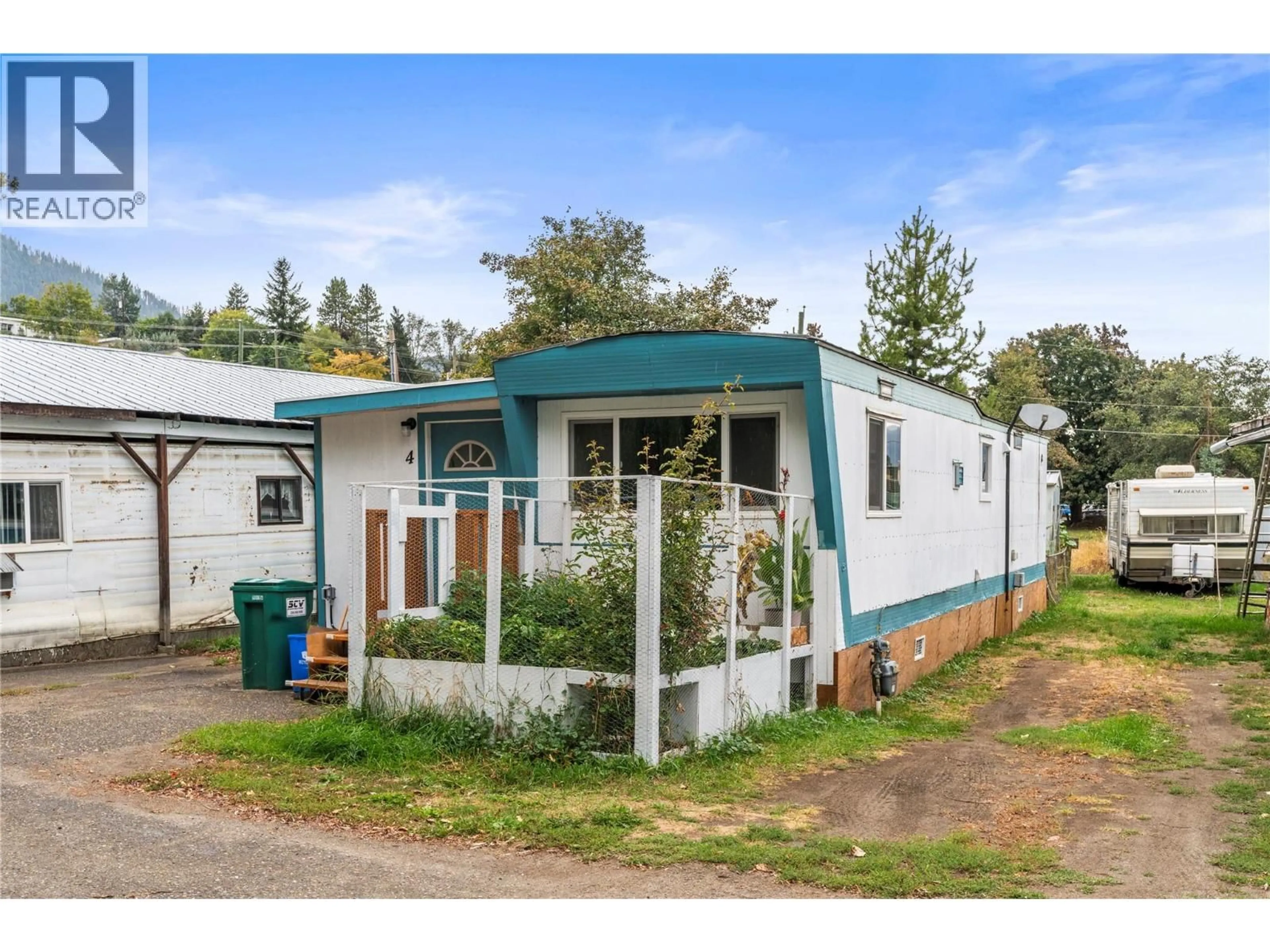 Home with vinyl exterior material, street for 4 - 1879 FAULKNER AVENUE, Lumby British Columbia V0E2G0