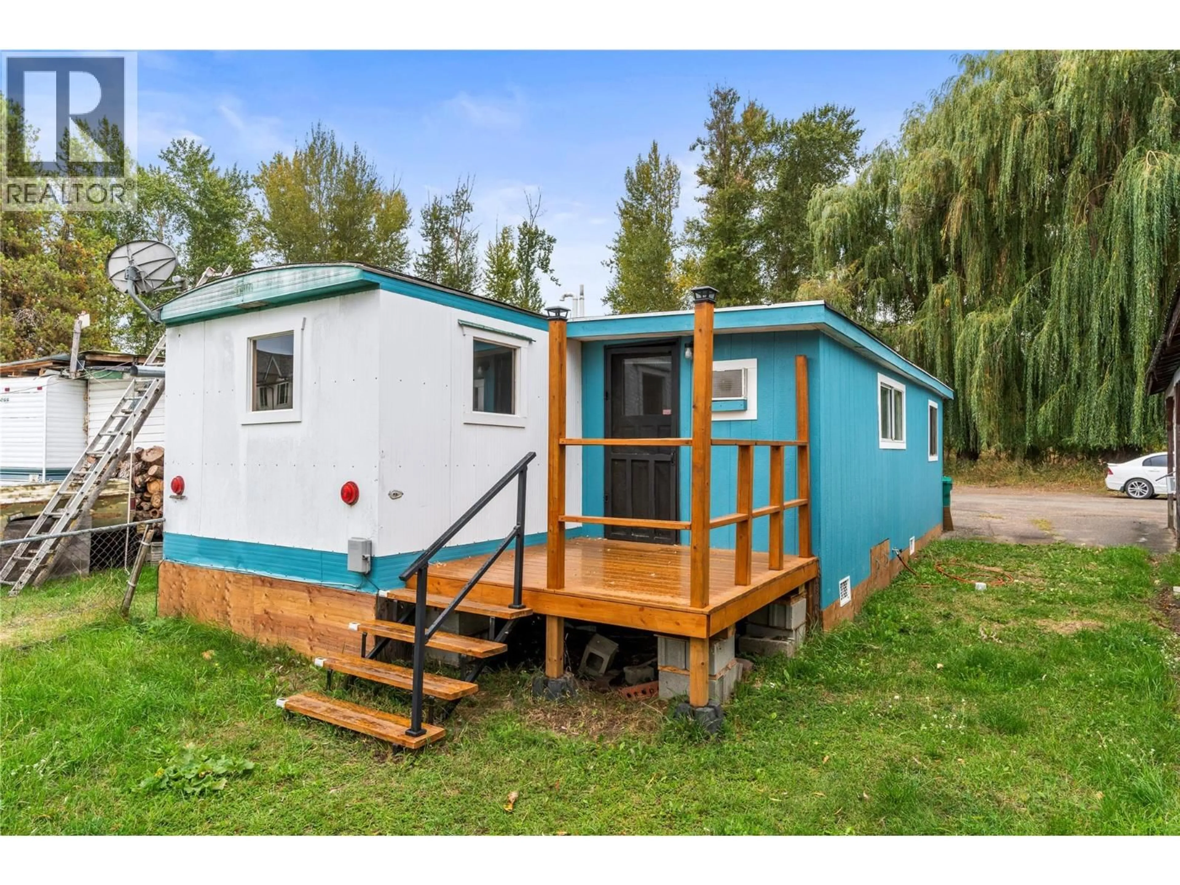 Home with vinyl exterior material, street for 4 - 1879 FAULKNER AVENUE, Lumby British Columbia V0E2G0