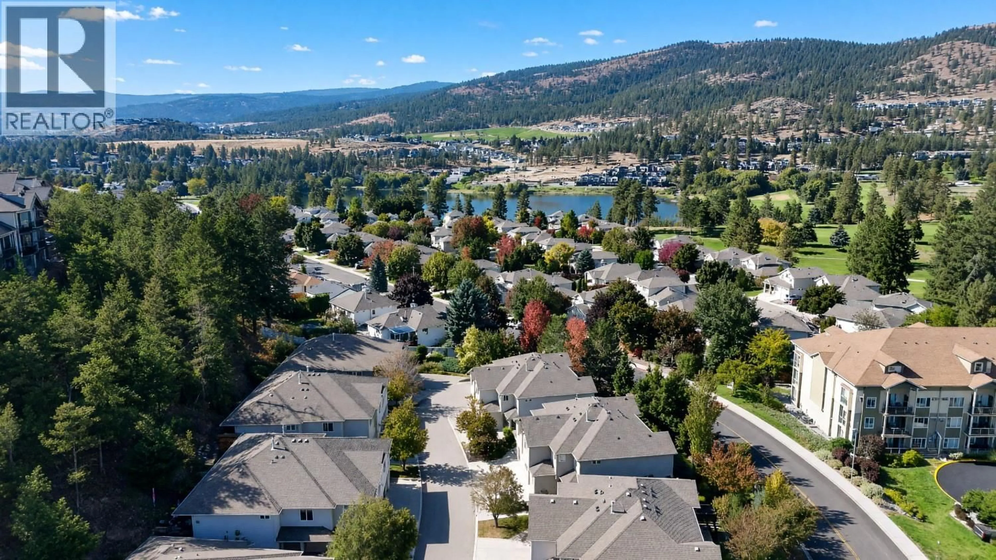 A pic from outside/outdoor area/front of a property/back of a property/a pic from drone, water/lake/river/ocean view for 5 - 2175 SHANNON RIDGE DRIVE, West Kelowna British Columbia V4T2L1