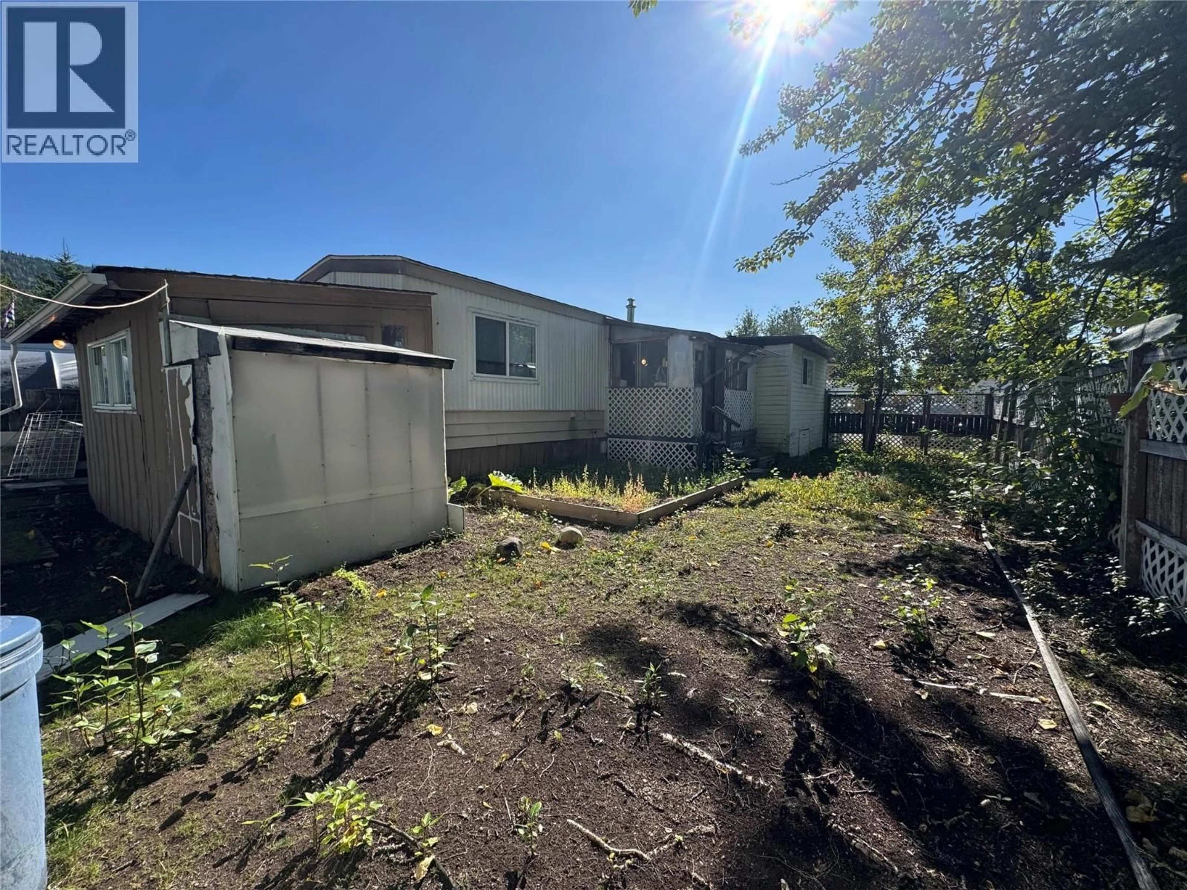 A pic from outside/outdoor area/front of a property/back of a property/a pic from drone, unknown for 230 ROCKPORT PLACE, Tumbler Ridge British Columbia V0C2W0