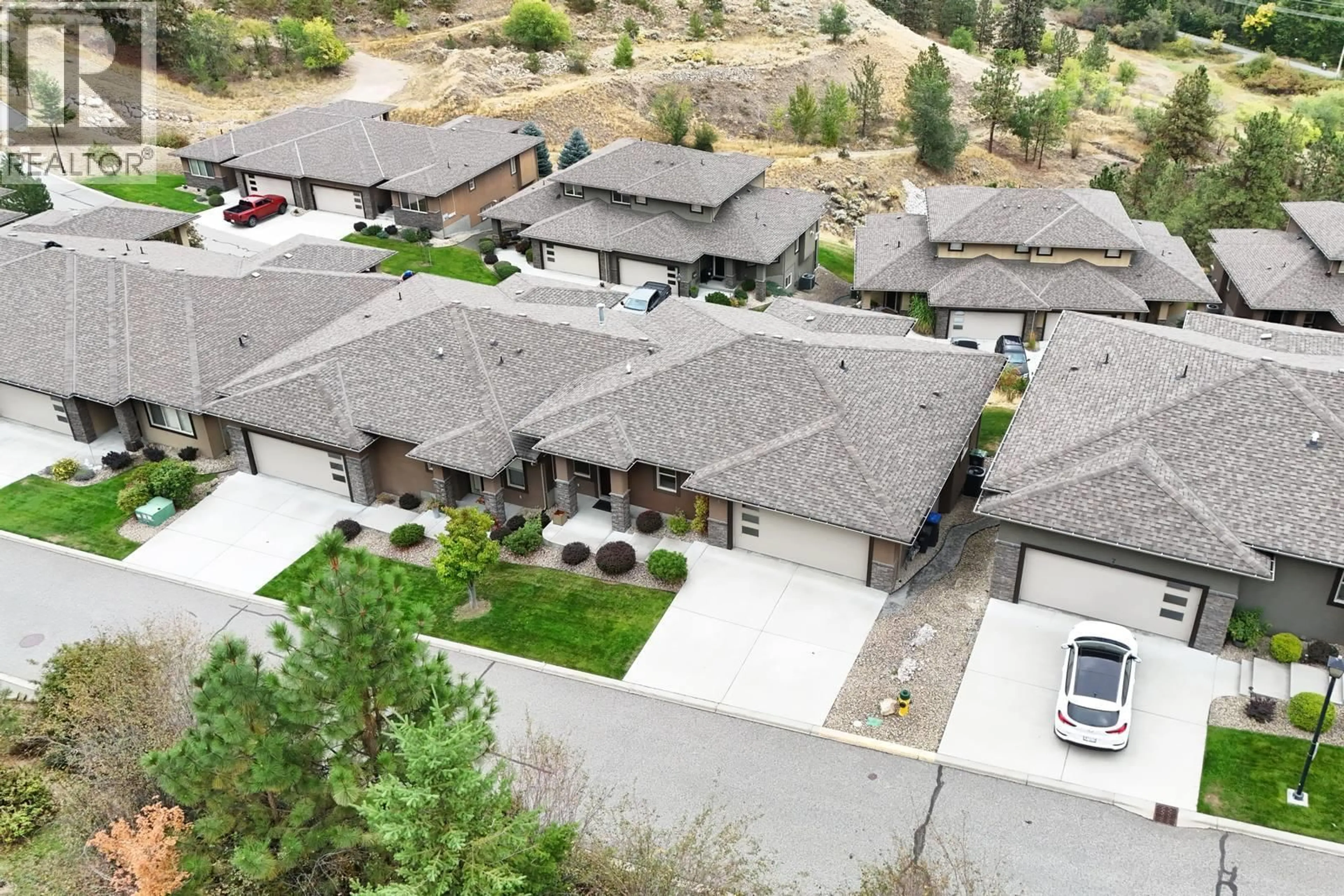 A pic from outside/outdoor area/front of a property/back of a property/a pic from drone, mountain view for 6 - 2421 GLACIER COURT, Kelowna British Columbia V1V3A6