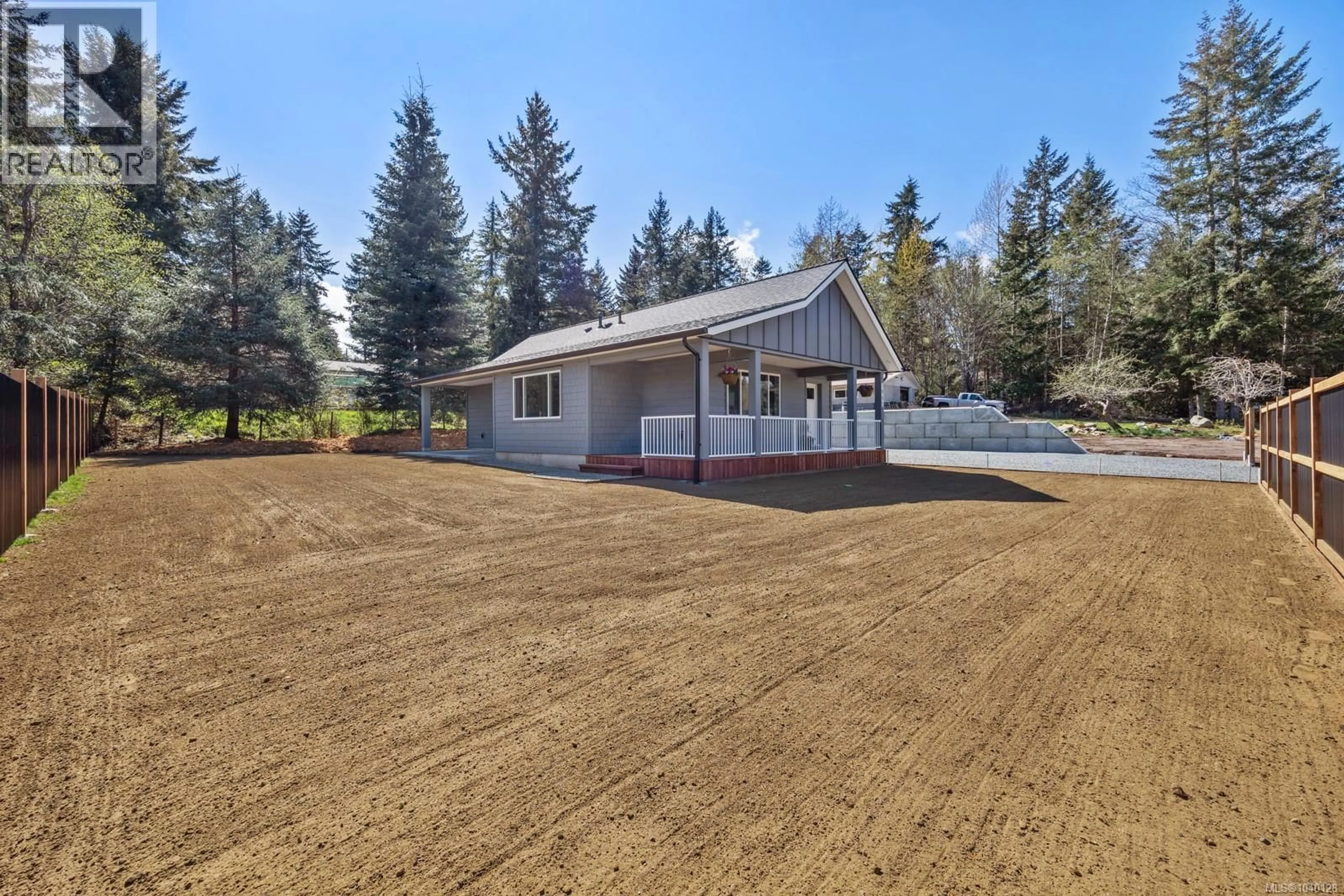 A pic from outside/outdoor area/front of a property/back of a property/a pic from drone, unknown for 1965 WILFRED ROAD, Black Creek British Columbia V9J1J8