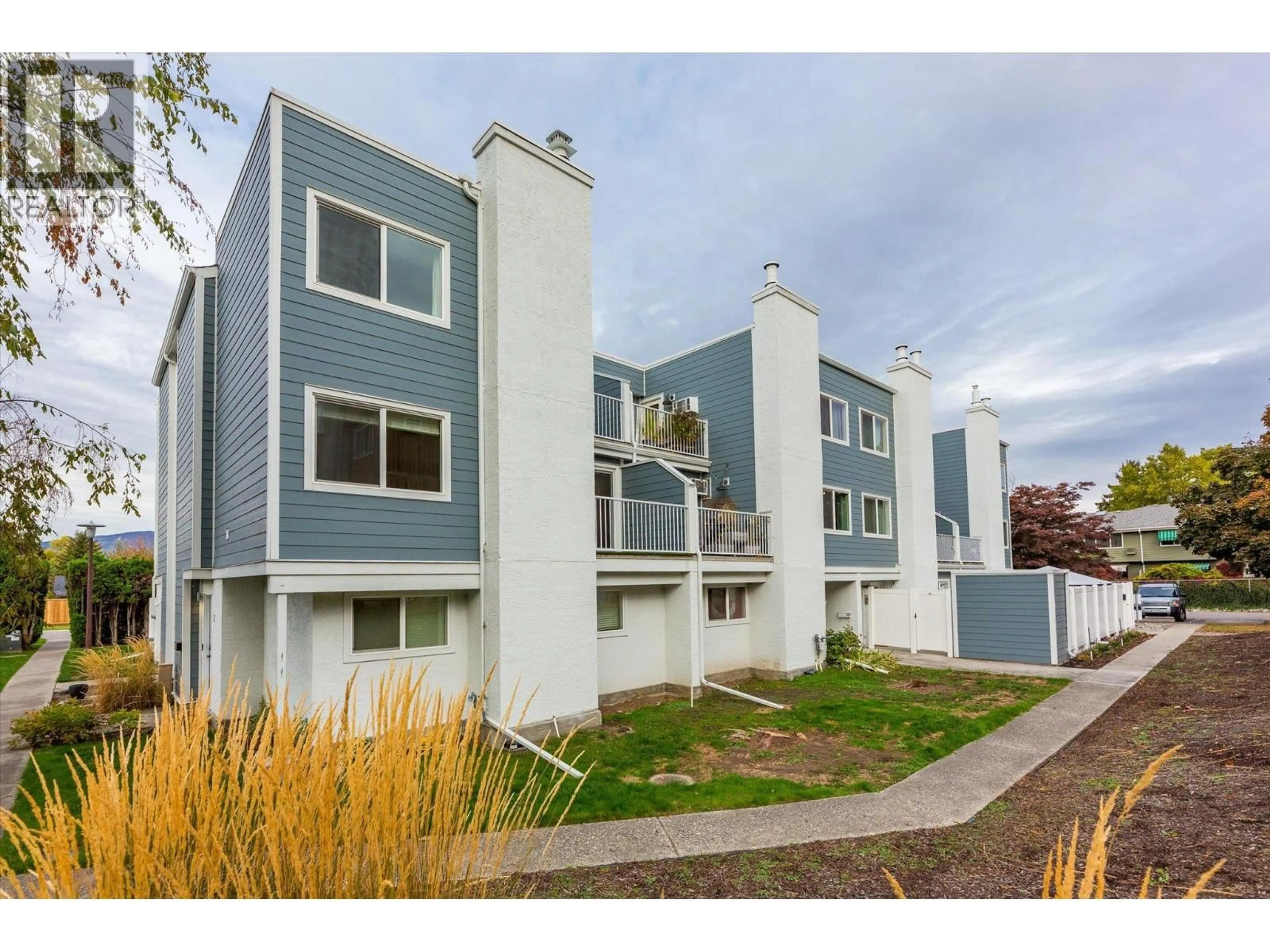 Home with vinyl exterior material, street for 9 - 1481 INKAR ROAD, Kelowna British Columbia V1Y8J1
