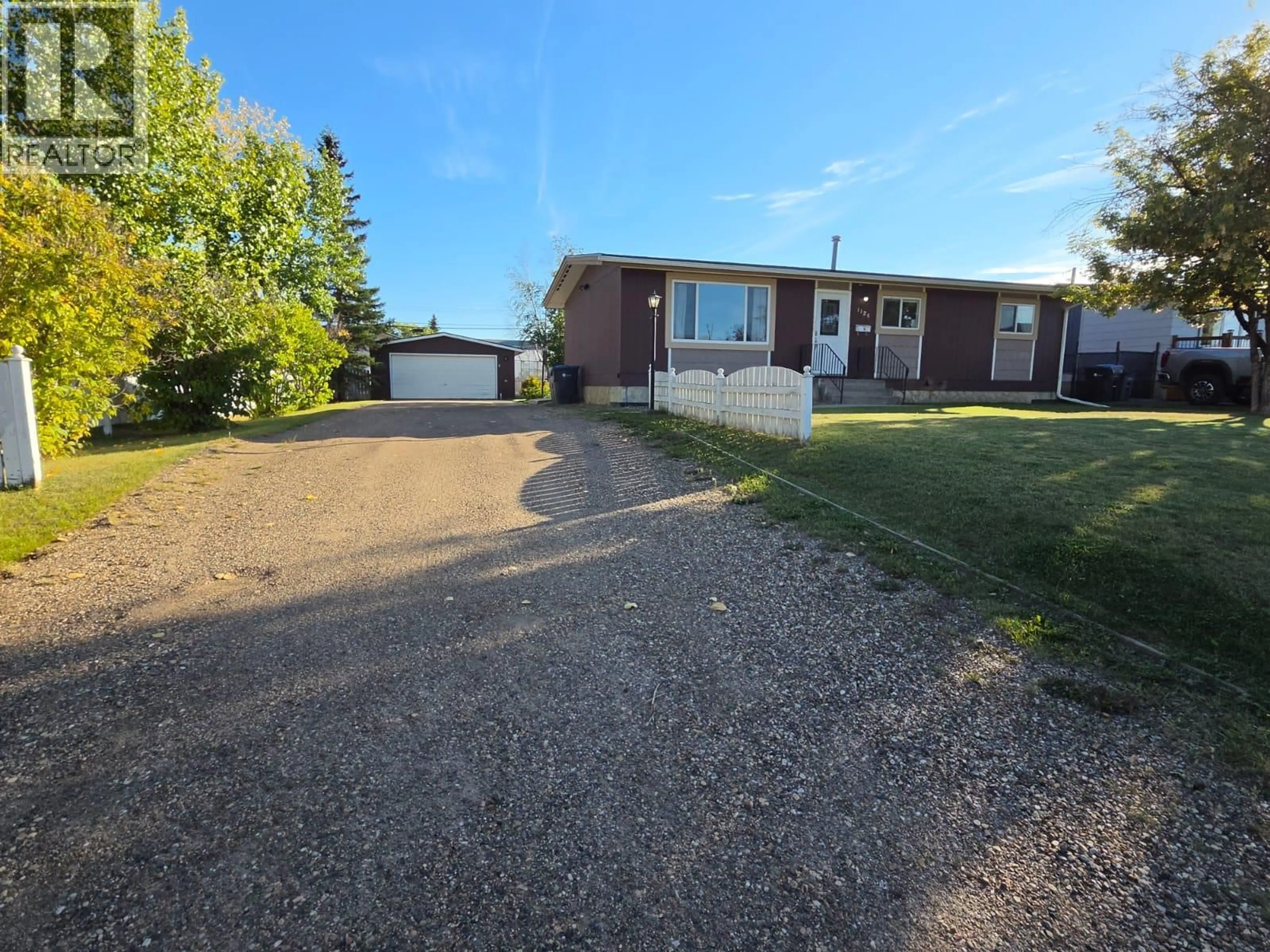 A pic from outside/outdoor area/front of a property/back of a property/a pic from drone, street for 1125 117 AVENUE, Dawson Creek British Columbia V1G3G8