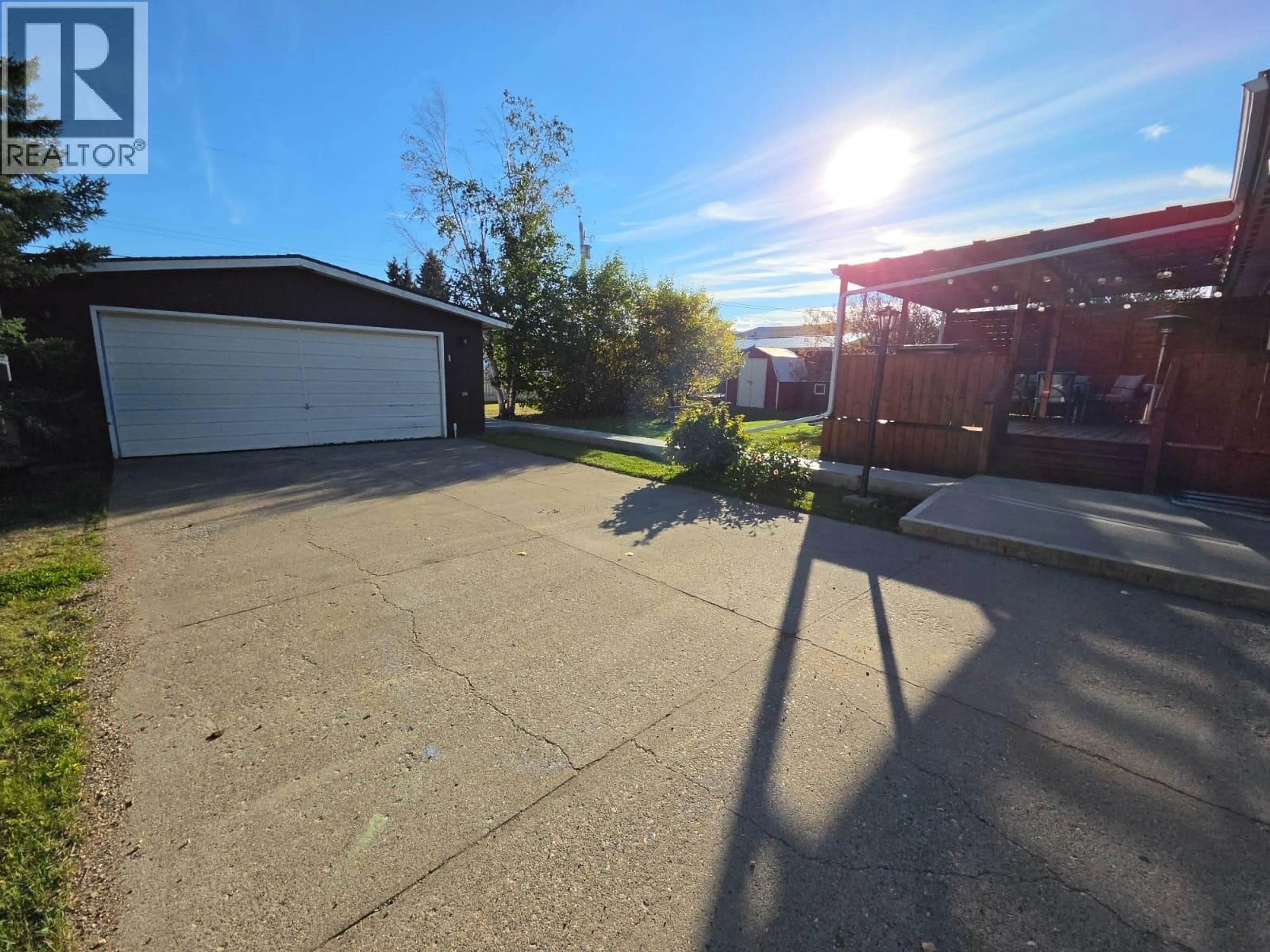 A pic from outside/outdoor area/front of a property/back of a property/a pic from drone, street for 1125 117 AVENUE, Dawson Creek British Columbia V1G3G8