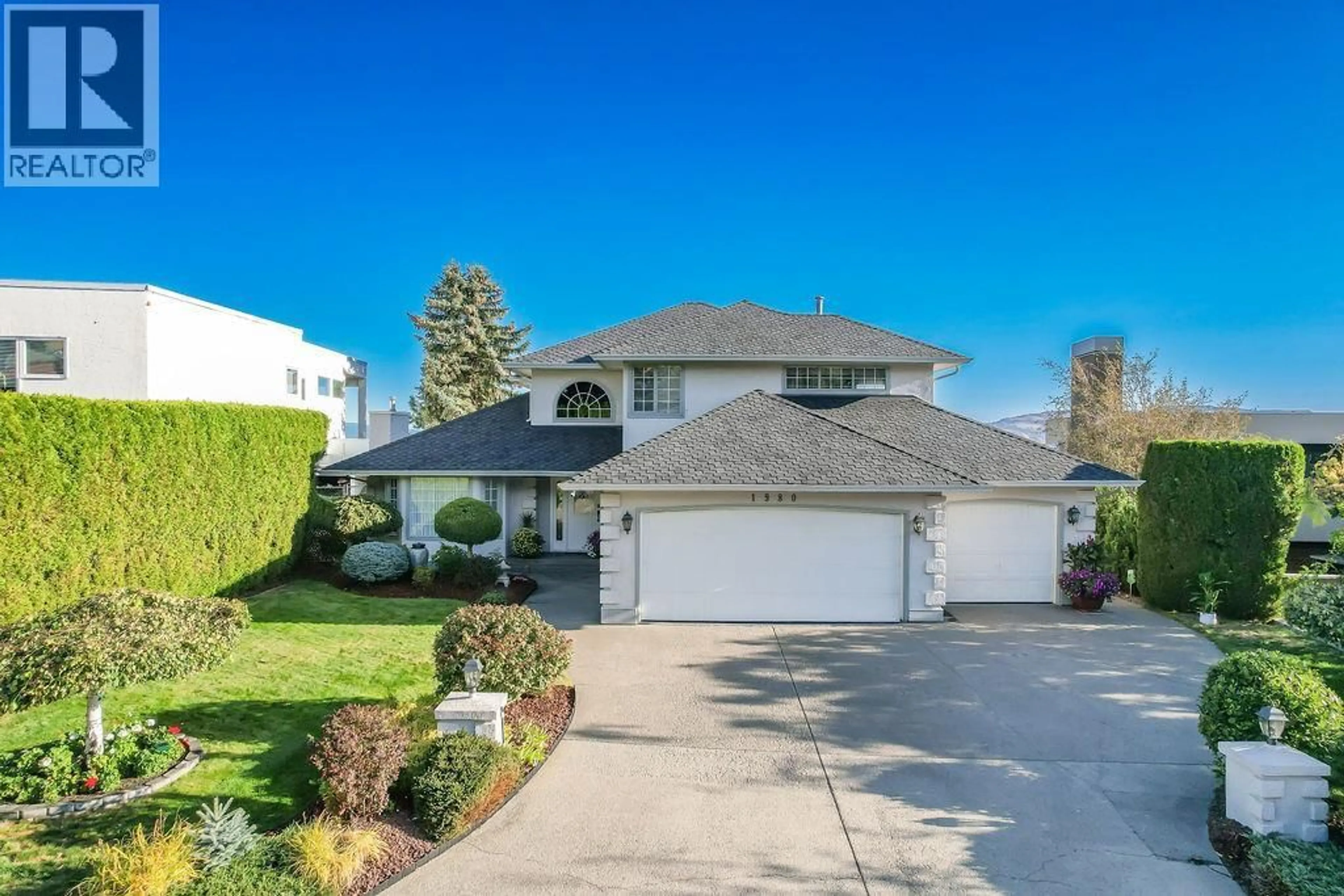 A pic from outside/outdoor area/front of a property/back of a property/a pic from drone, street for 1980 THE PINNACLES OTHER, Kamloops British Columbia V2E2L3
