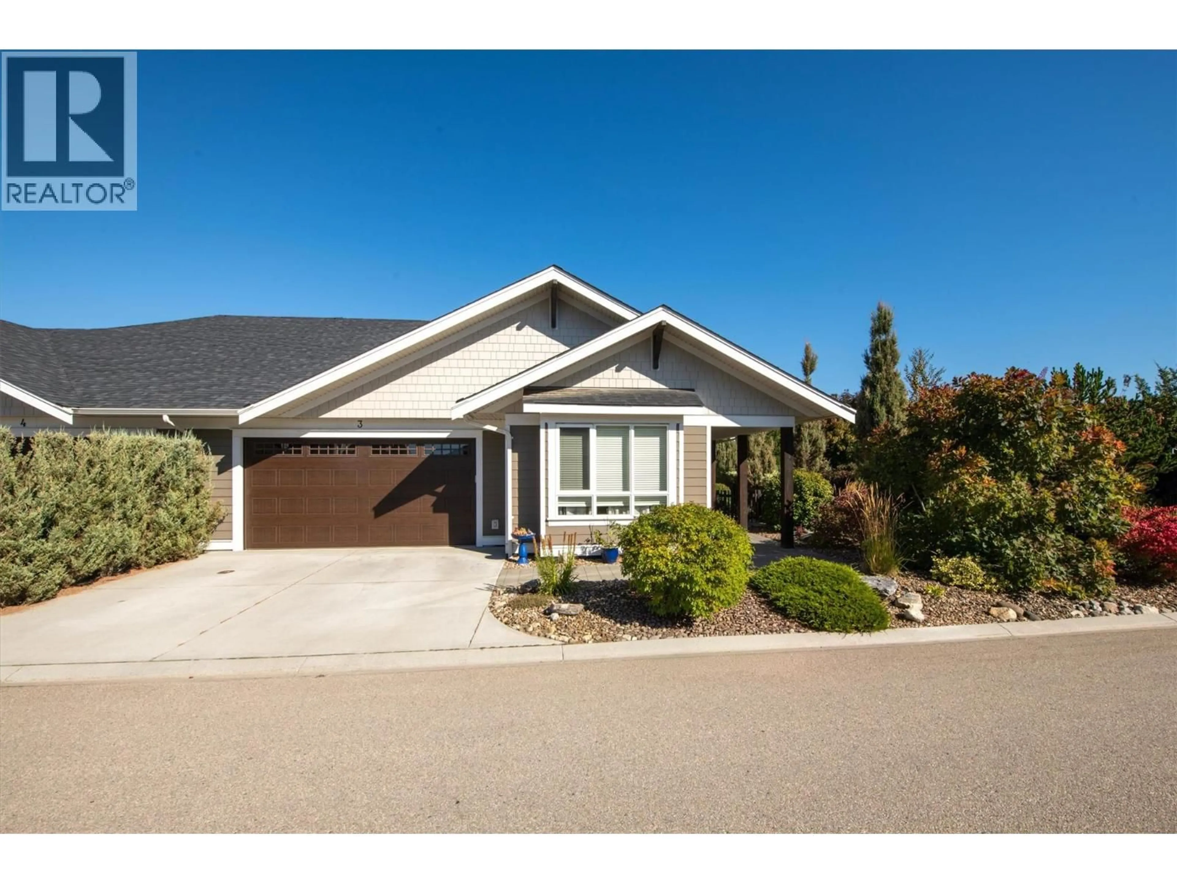 Home with brick exterior material, street for 3 - 1960 KLO ROAD, Kelowna British Columbia V1W5L2