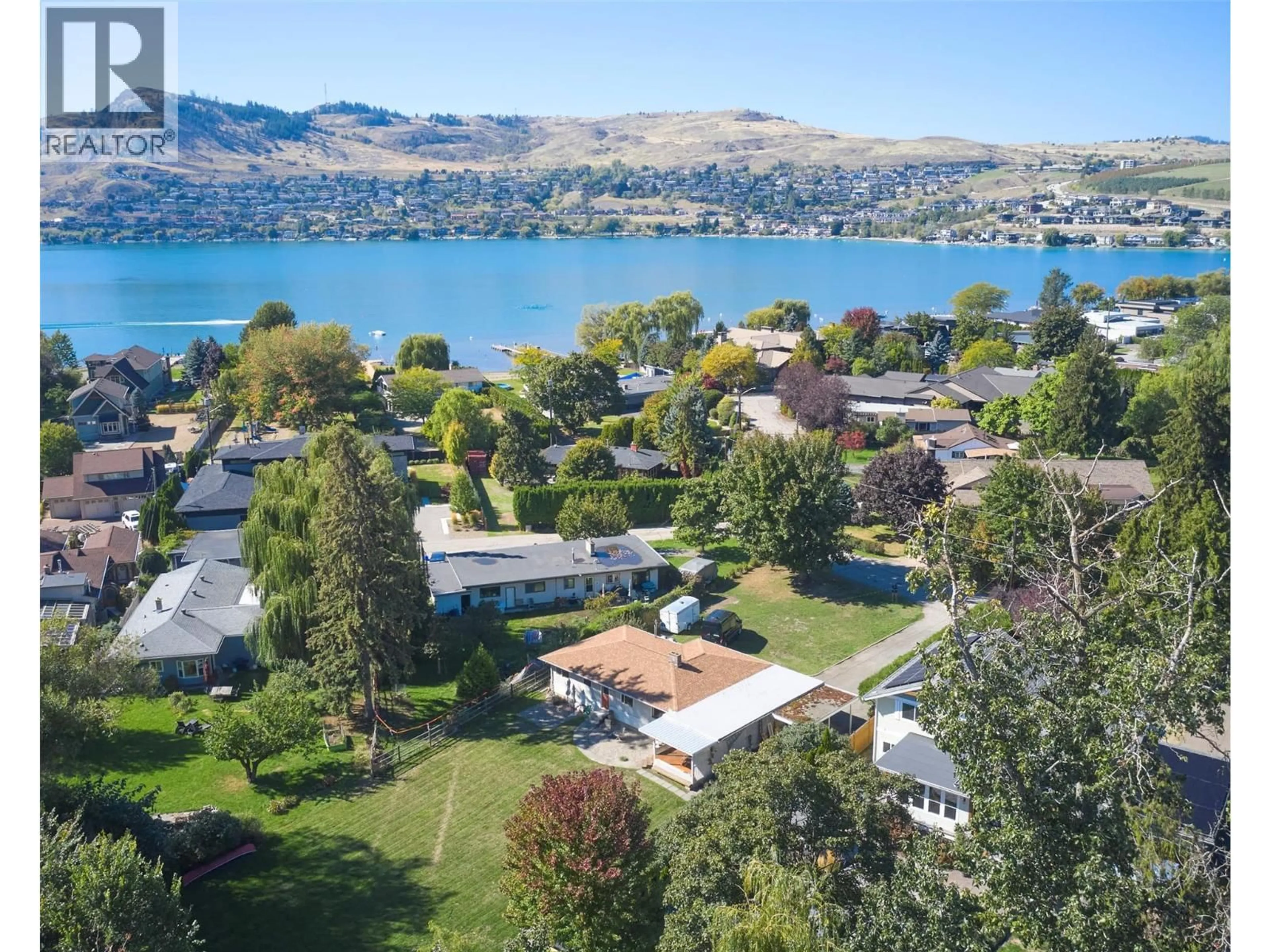 A pic from outside/outdoor area/front of a property/back of a property/a pic from drone, water/lake/river/ocean view for 12310 KALAVISTA DRIVE, Coldstream British Columbia V1B1K5