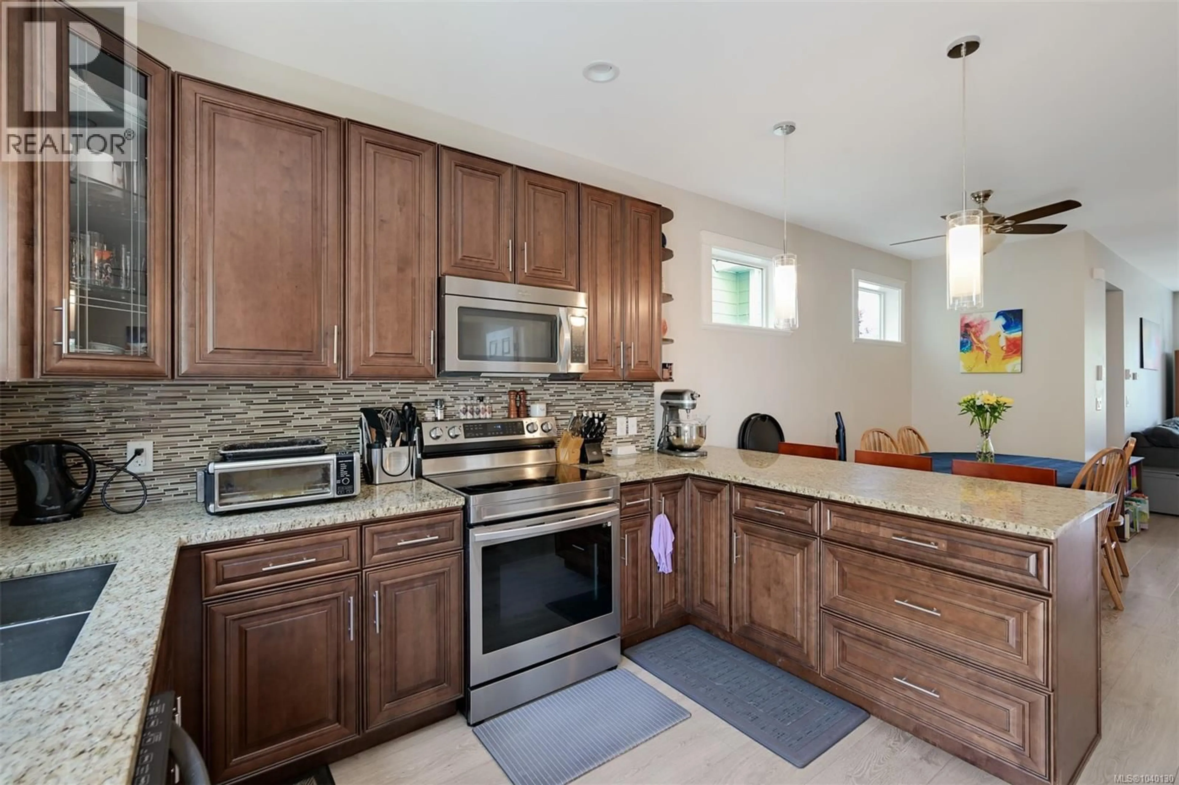 Open concept kitchen, ceramic/tile floor for 3367 VISION WAY, Langford British Columbia V9C0E4