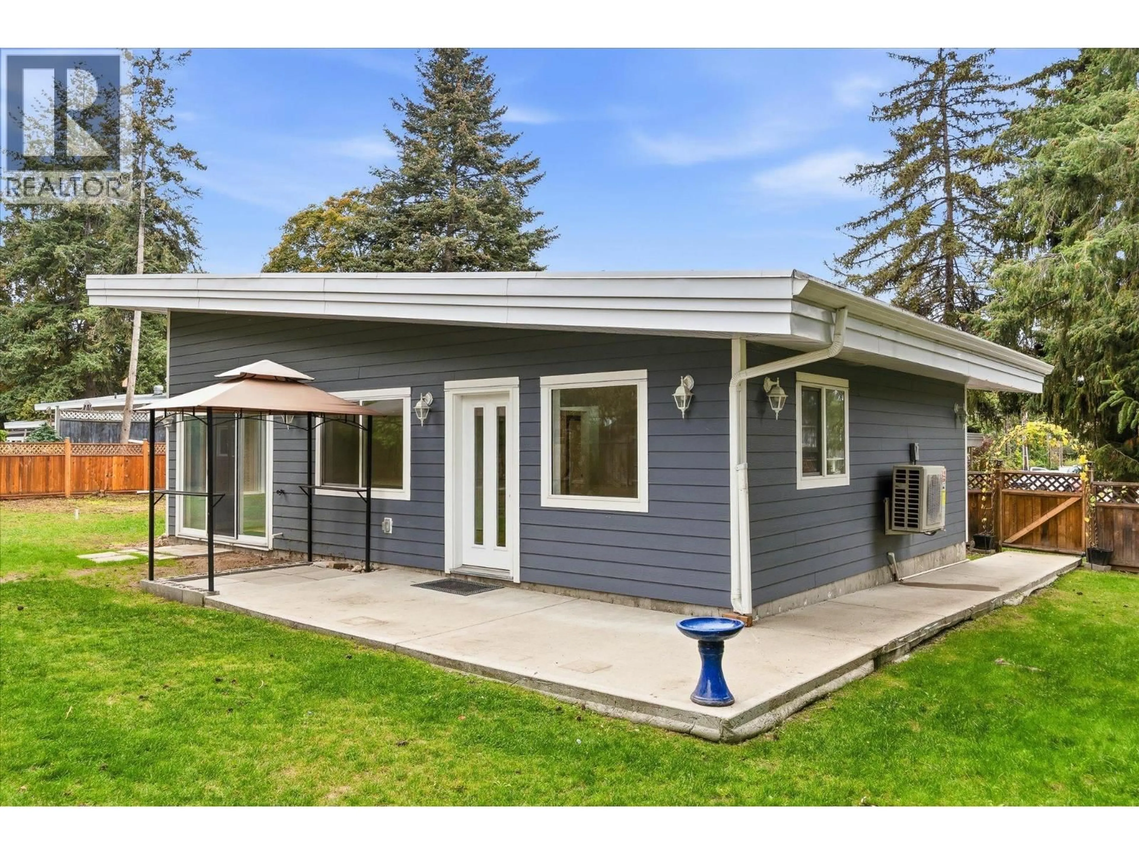 Home with vinyl exterior material, street for 4583 BONJOU ROAD, Kelowna British Columbia V1W1M7