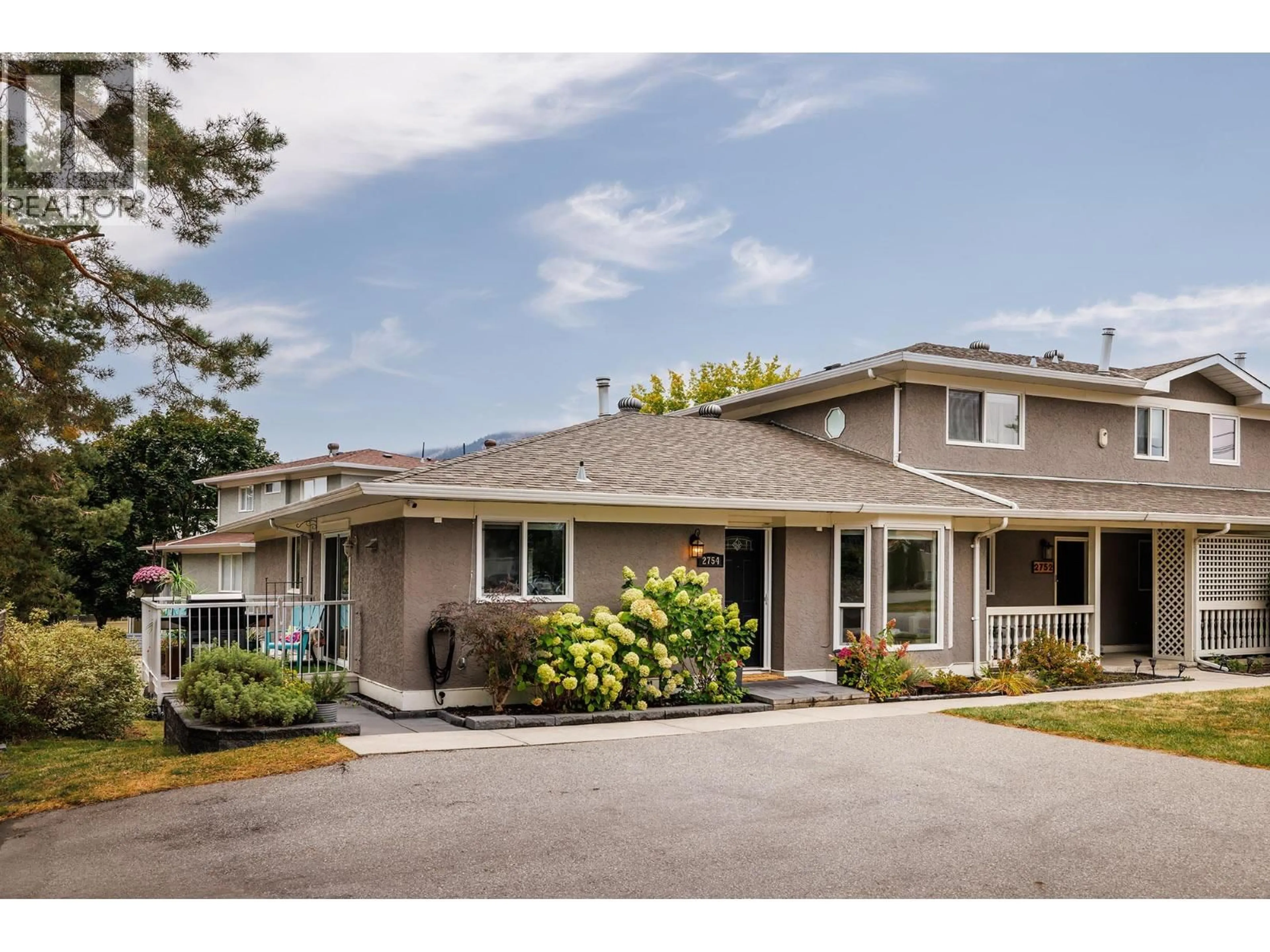 Home with vinyl exterior material, street for 2754 CAMERON ROAD, West Kelowna British Columbia V1Z3K5