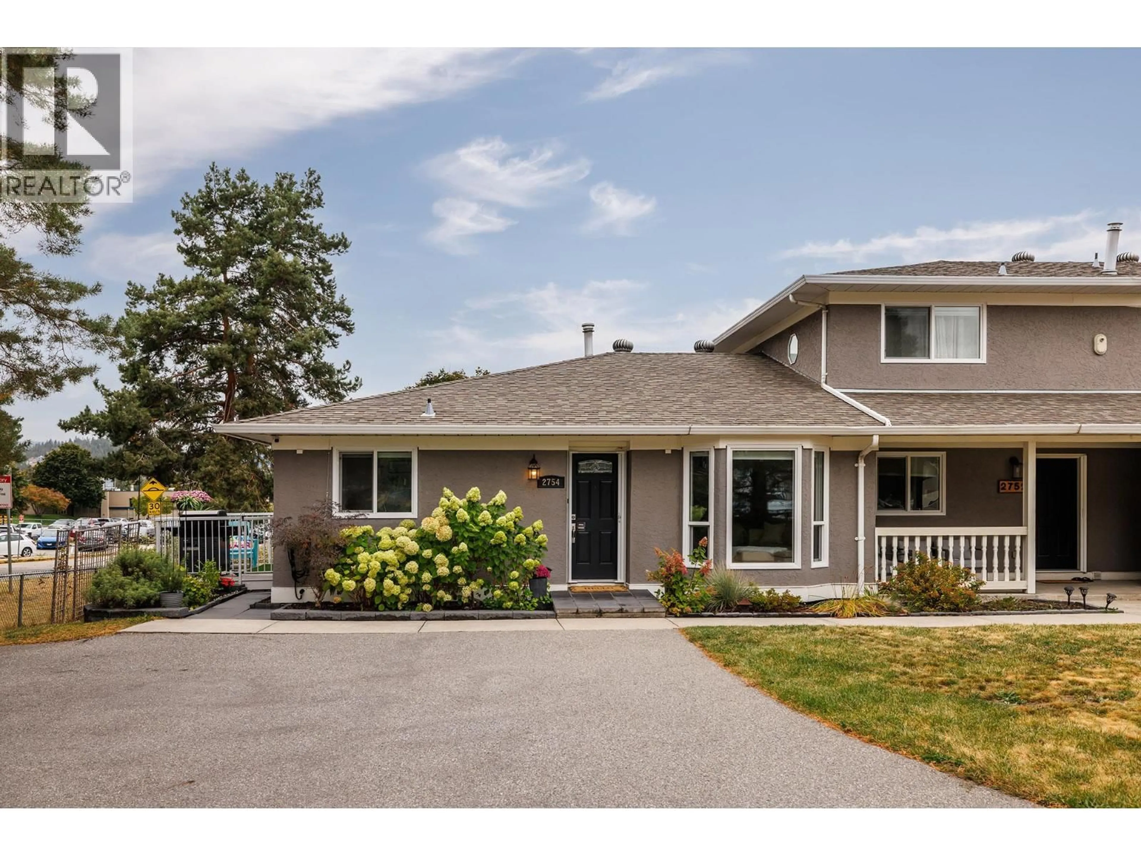 Home with vinyl exterior material, street for 2754 CAMERON ROAD, West Kelowna British Columbia V1Z3K5