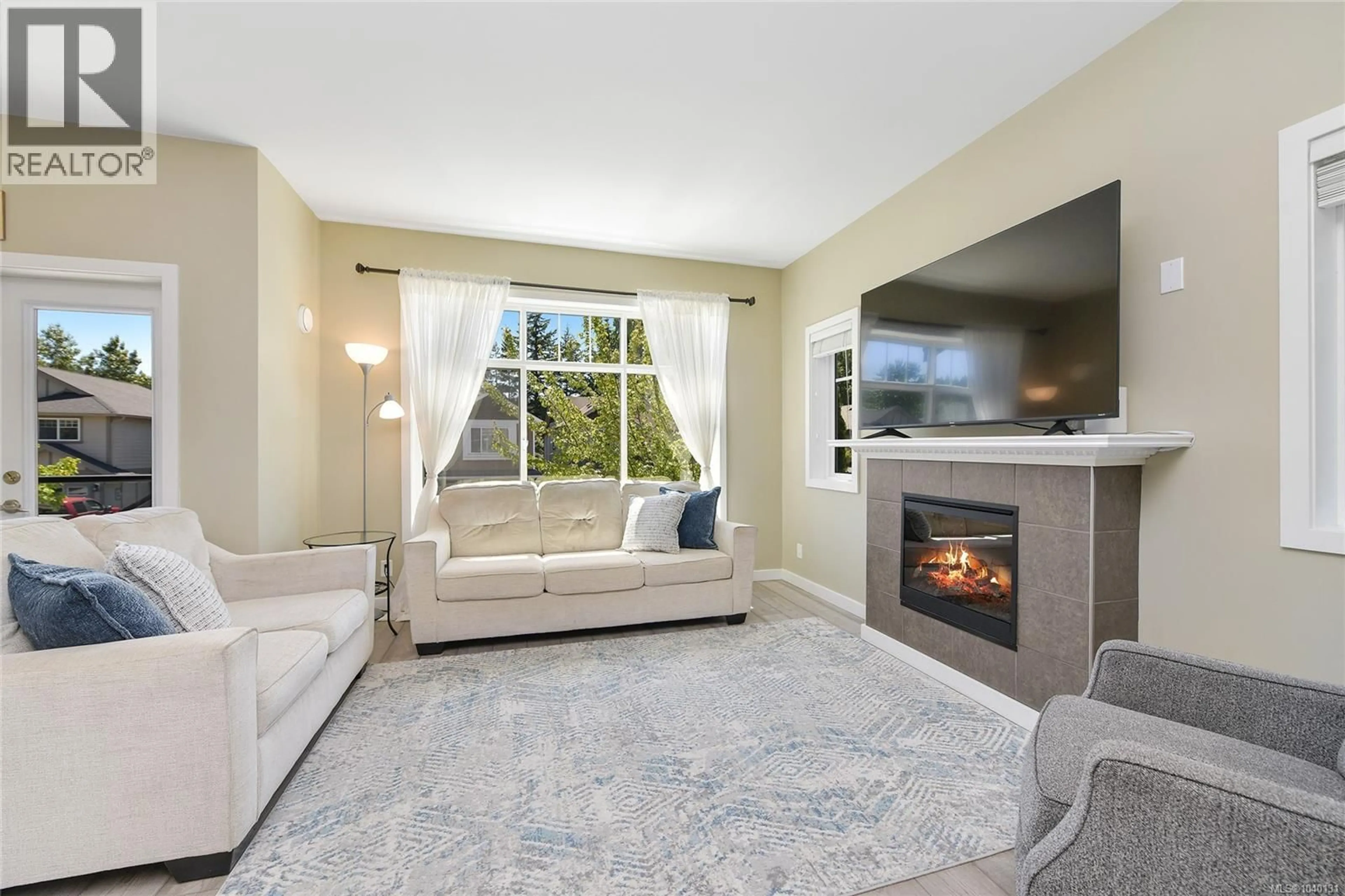 Living room with furniture, unknown for 992 FIREHALL CREEK ROAD, Langford British Columbia V9C0A2