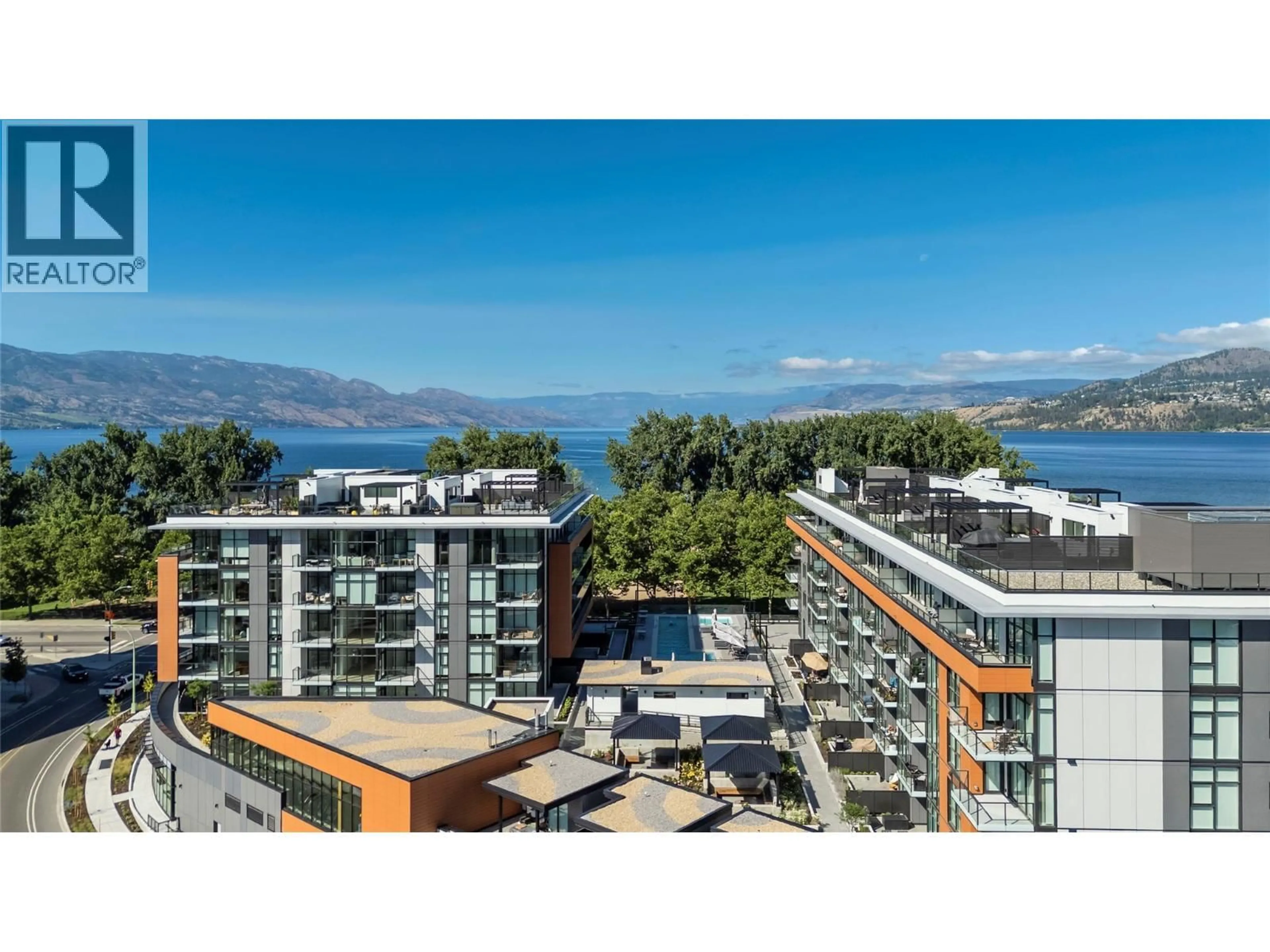 A pic from outside/outdoor area/front of a property/back of a property/a pic from drone, water/lake/river/ocean view for 315 - 3389 LAKESHORE ROAD, Kelowna British Columbia V1W0G5