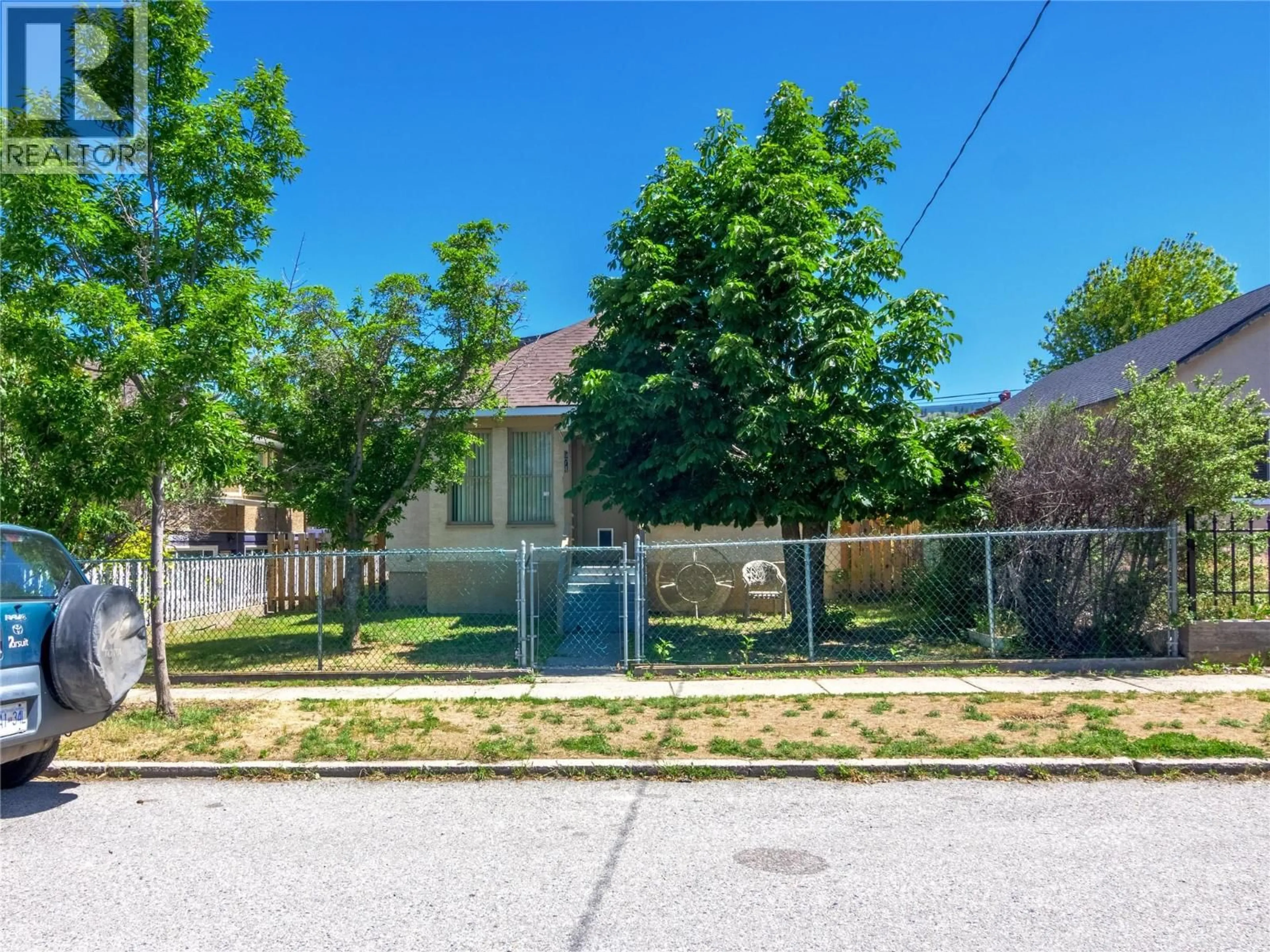 A pic from outside/outdoor area/front of a property/back of a property/a pic from drone, street for 574 VAN HORNE STREET, Penticton British Columbia V2A4K8
