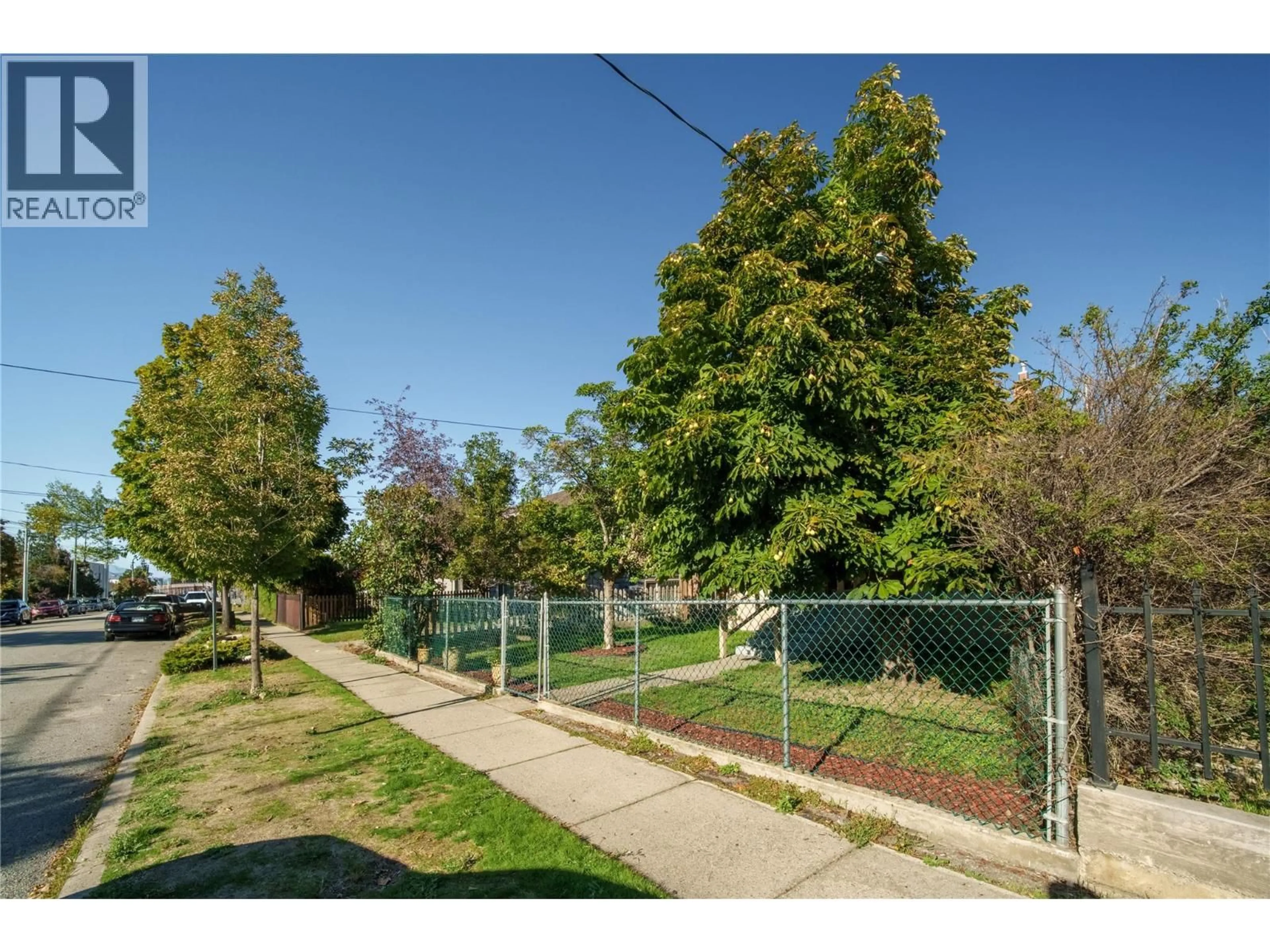 A pic from outside/outdoor area/front of a property/back of a property/a pic from drone, street for 574 VAN HORNE STREET, Penticton British Columbia V2A4K8