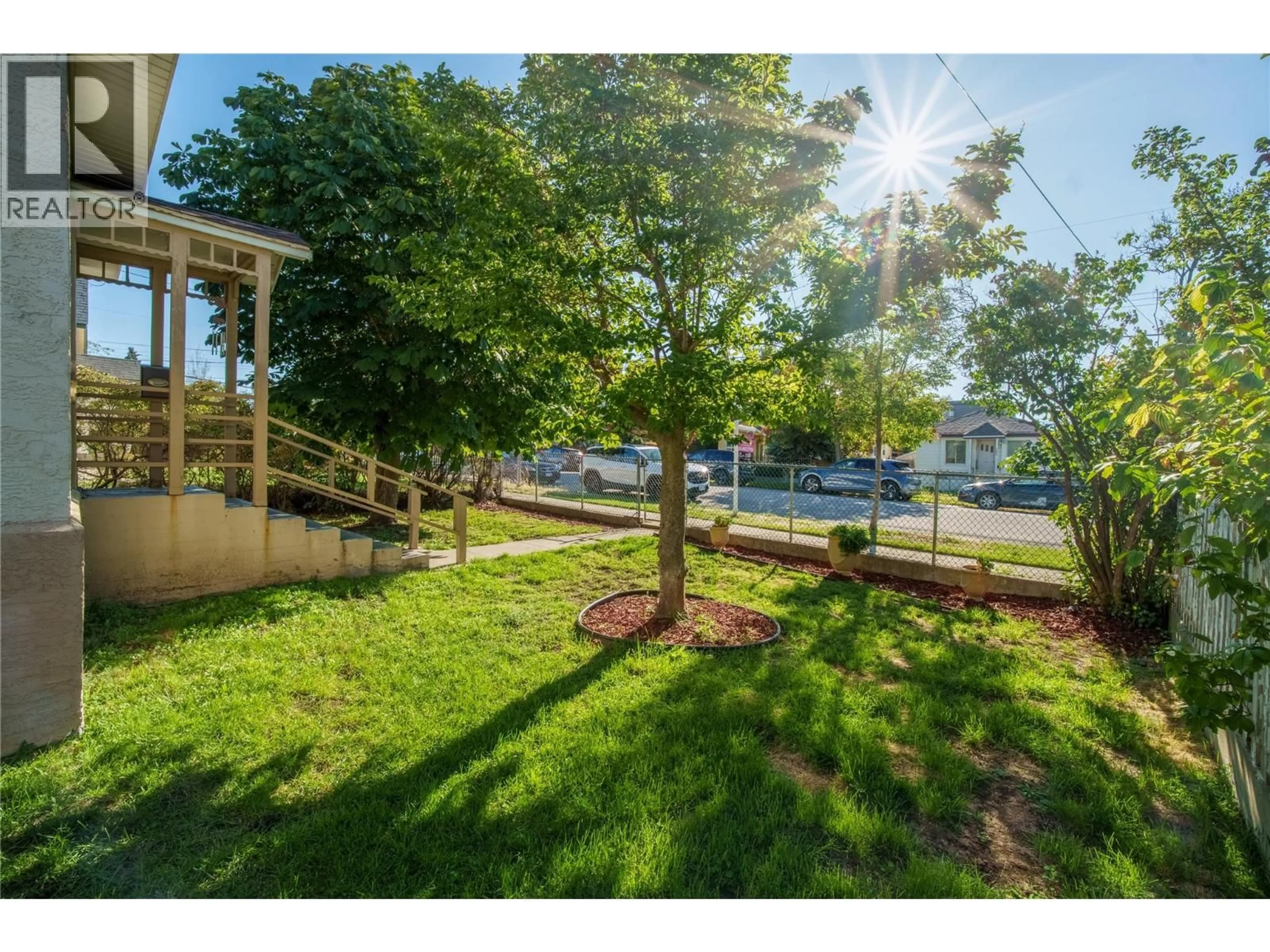 A pic from outside/outdoor area/front of a property/back of a property/a pic from drone, forest/trees view for 574 VAN HORNE STREET, Penticton British Columbia V2A4K8