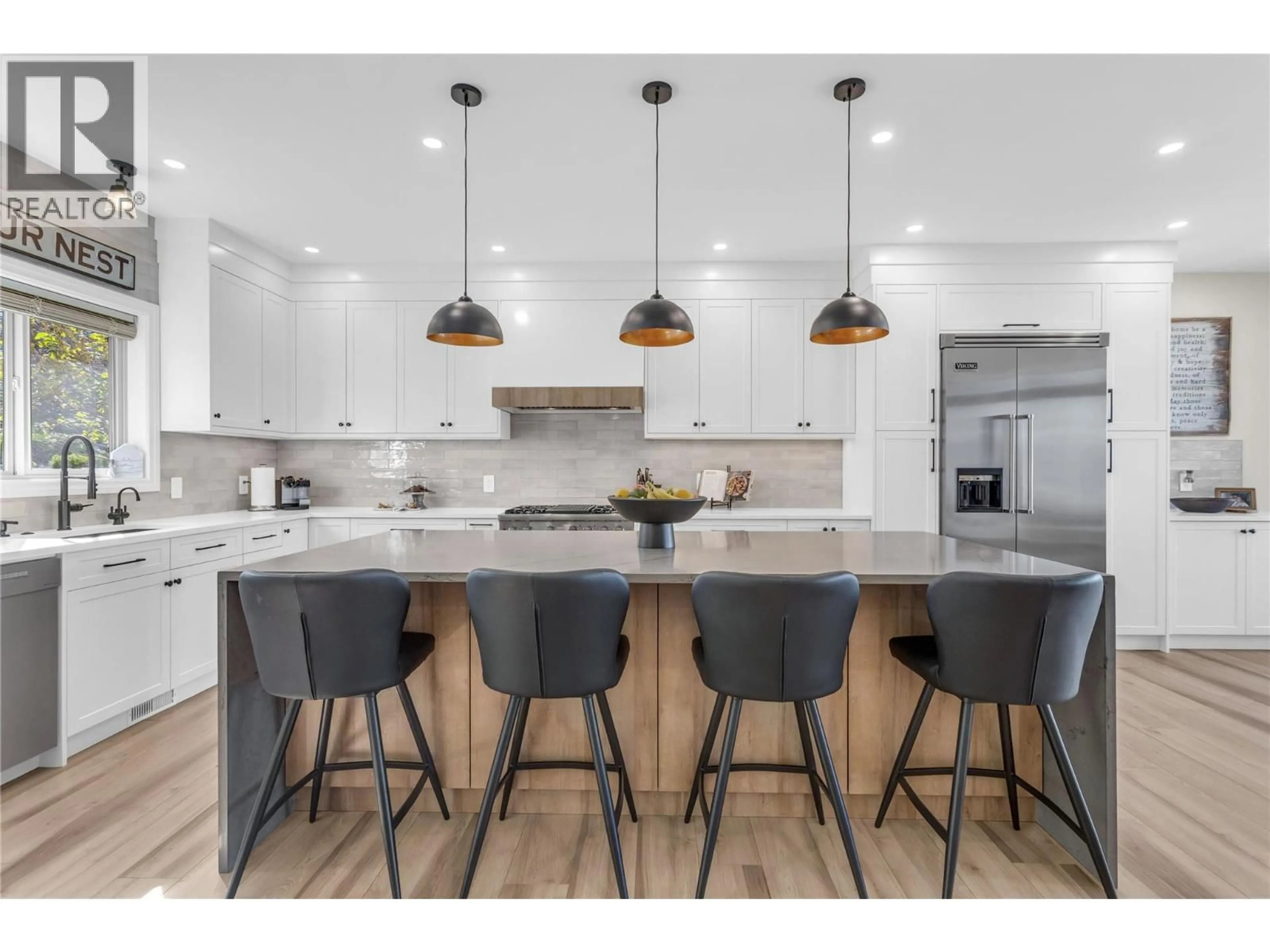 Open concept kitchen, wood/laminate floor for 1113 MT FOSTHALL DRIVE, Vernon British Columbia V1B3Z3
