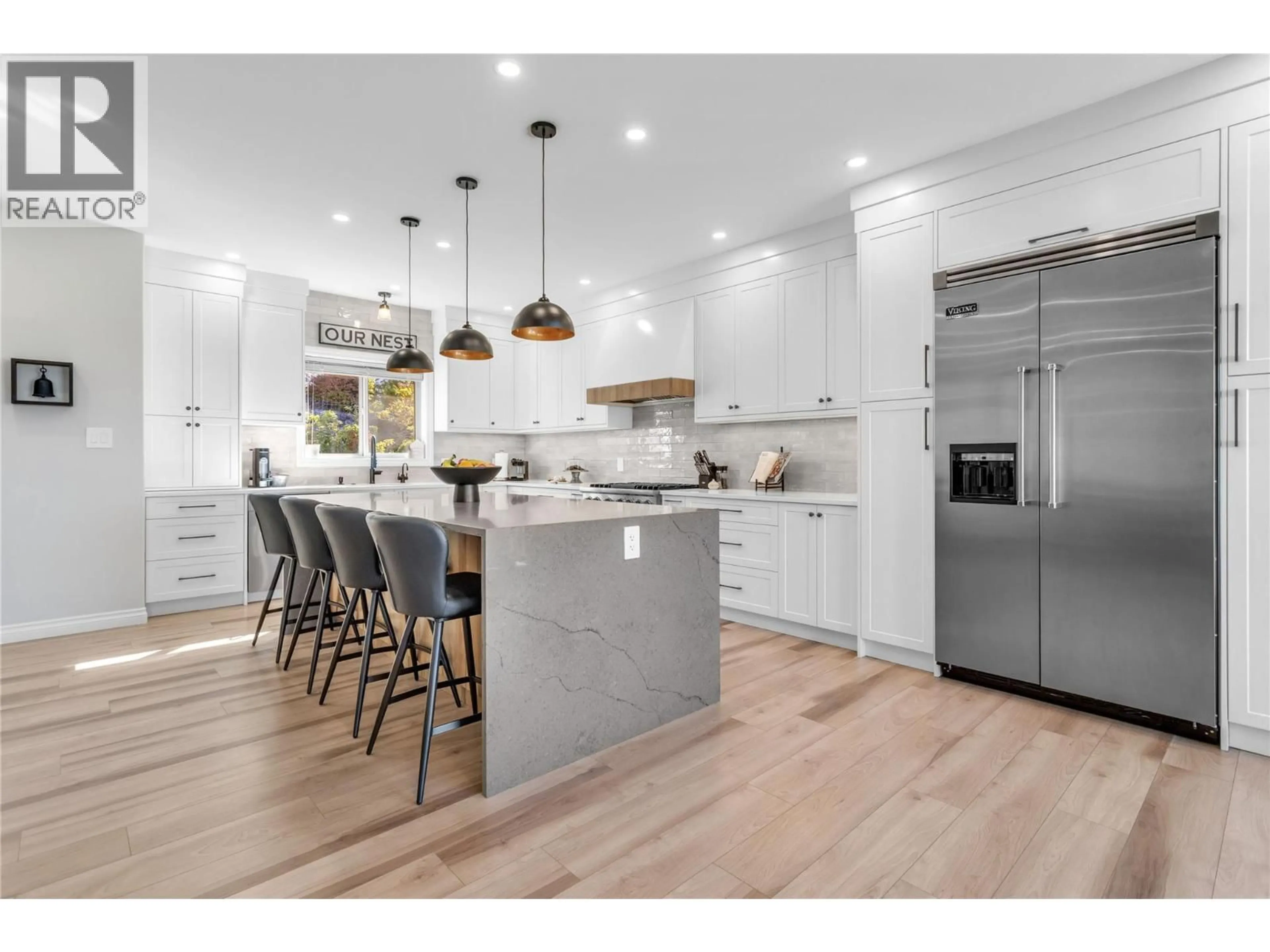 Open concept kitchen, wood/laminate floor for 1113 MT FOSTHALL DRIVE, Vernon British Columbia V1B3Z3