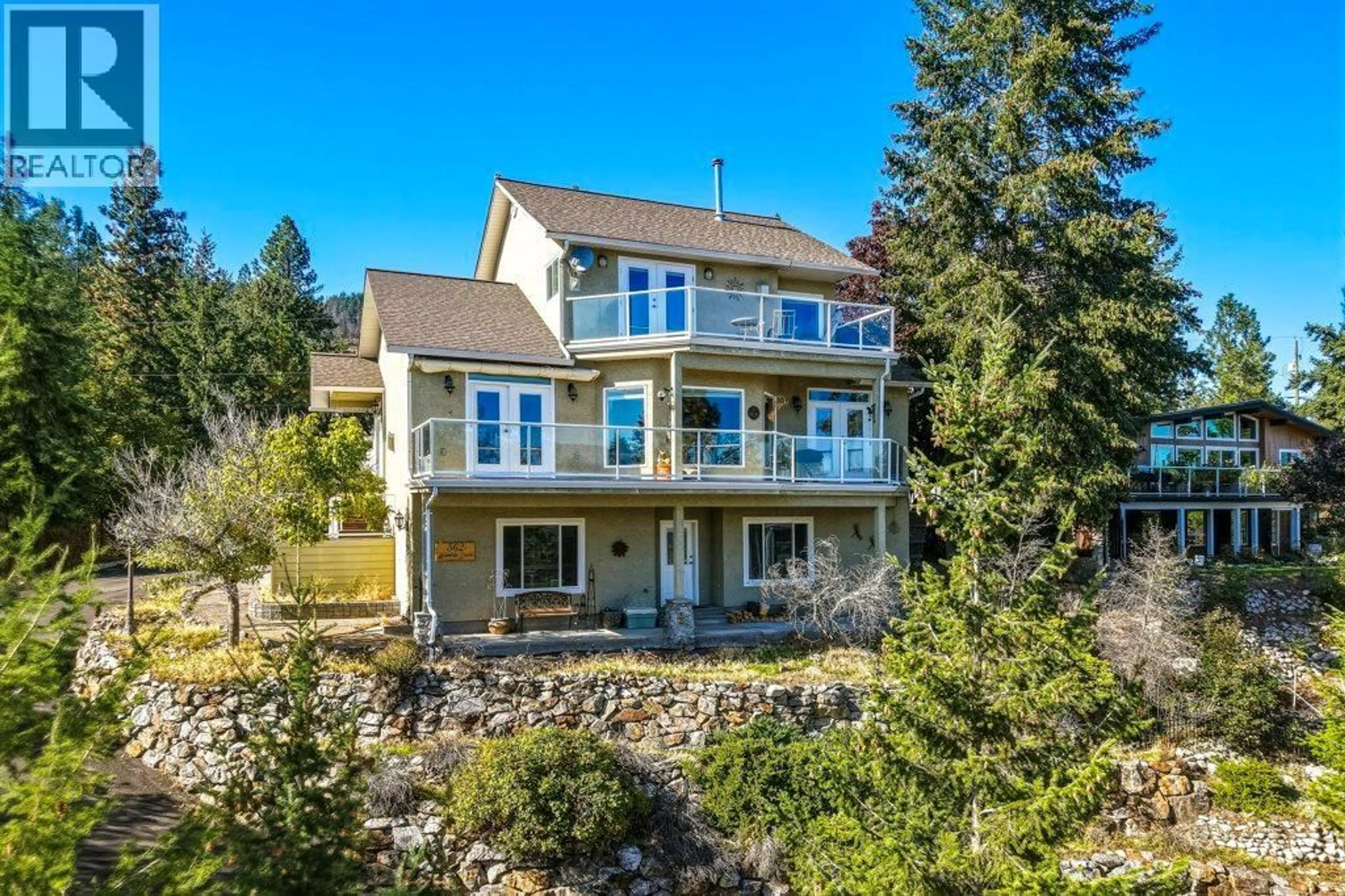 A pic from outside/outdoor area/front of a property/back of a property/a pic from drone, water/lake/river/ocean view for 562 MOUNTAIN DRIVE, Vernon British Columbia V1H2B7