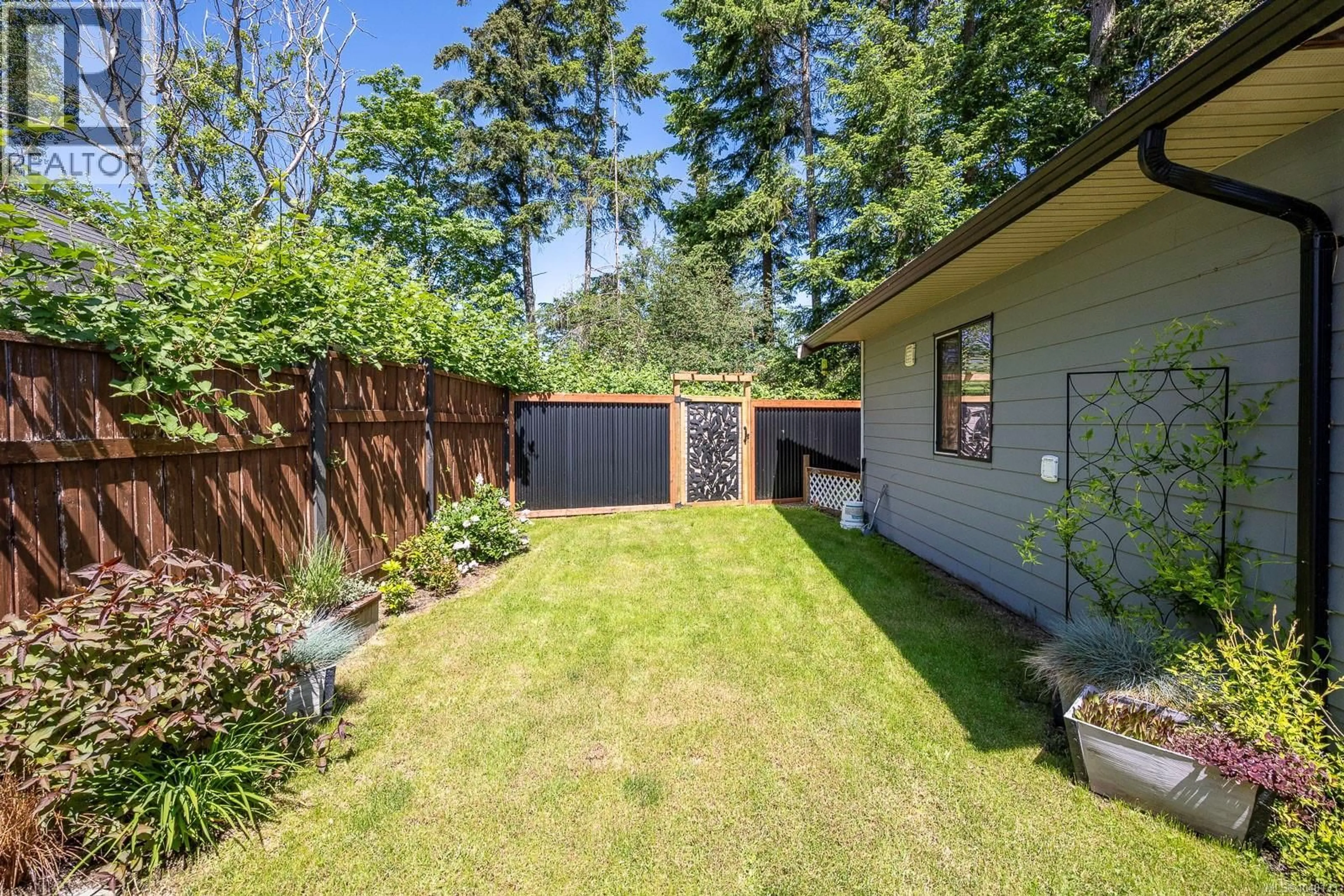 Patio, forest/trees view for 2102 STADACONA DRIVE, Comox British Columbia V9M3P7