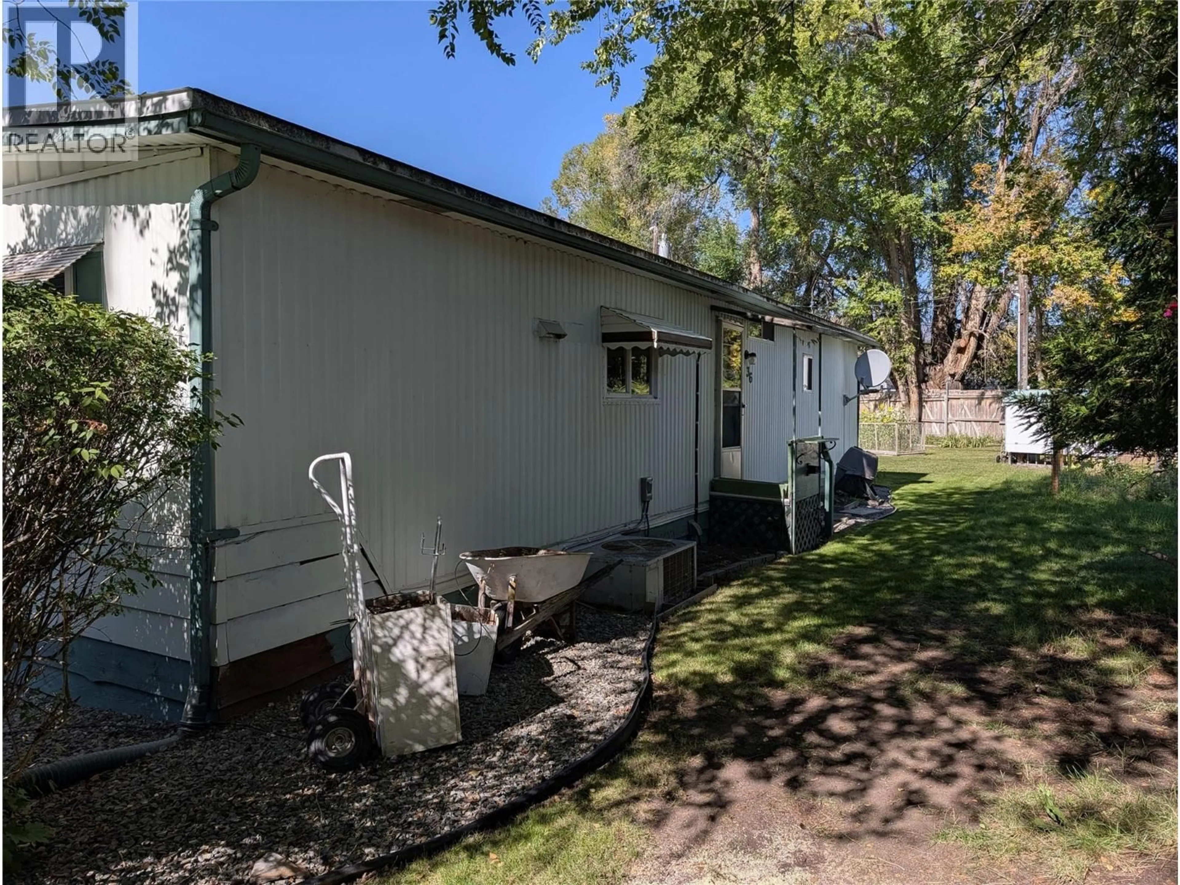 A pic from outside/outdoor area/front of a property/back of a property/a pic from drone, street for 36 - 3535 CASORSO ROAD, Kelowna British Columbia V1W3E1