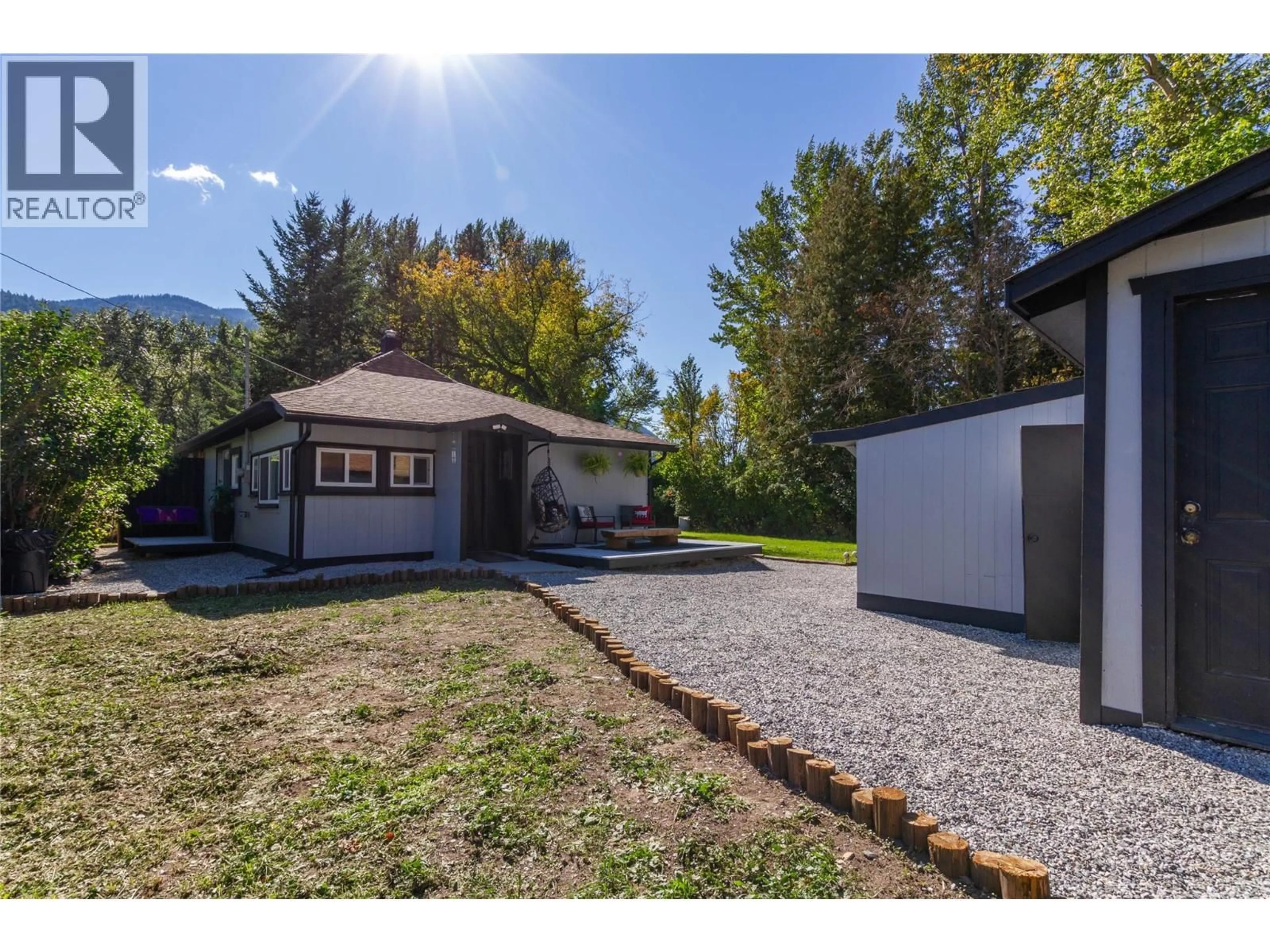 A pic from outside/outdoor area/front of a property/back of a property/a pic from drone, street for 2946 SEAMAN ROAD, Falkland British Columbia V0E1W0