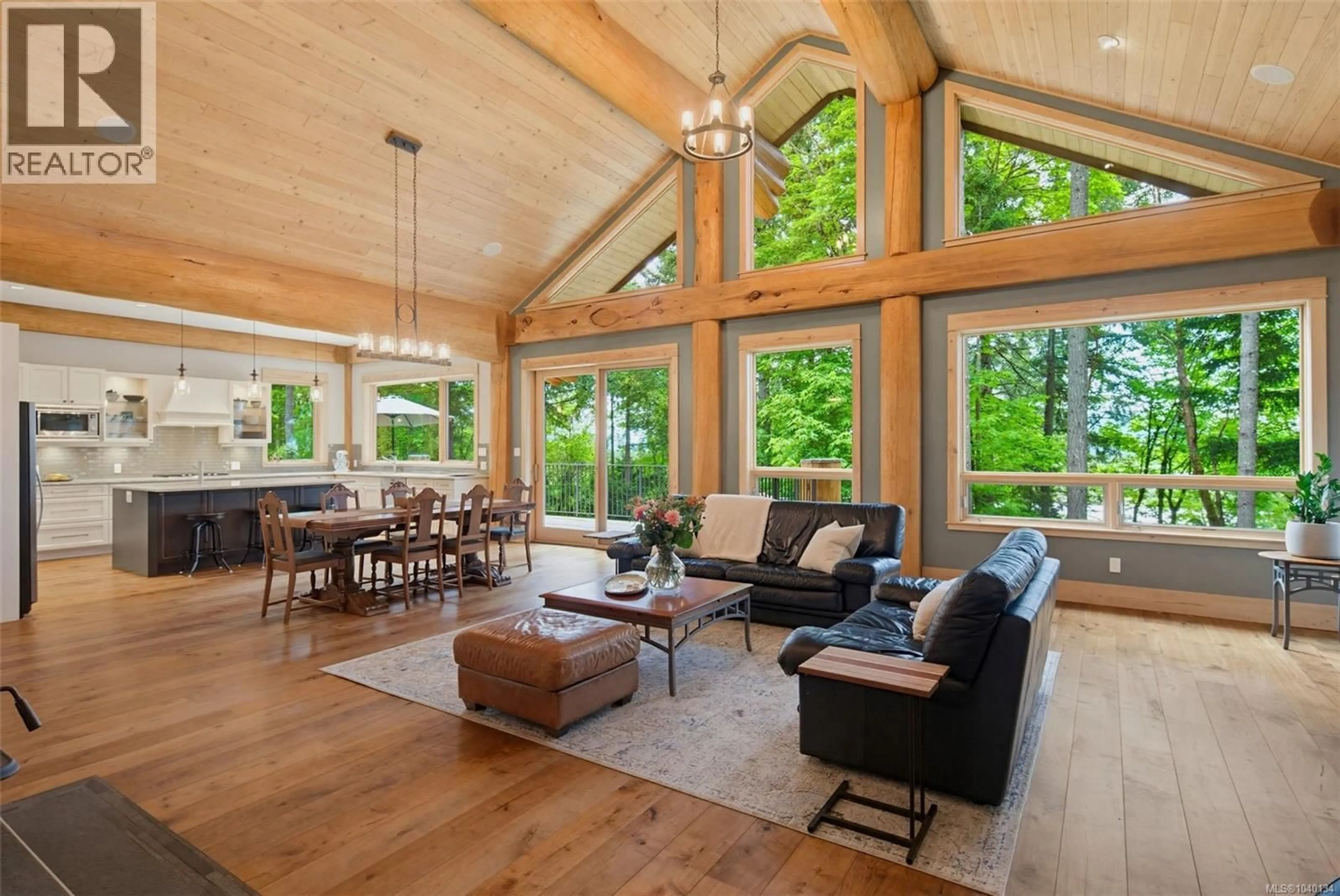 Living room with furniture, wood/laminate floor for 1291 BENVENUTO AVENUE, Central Saanich British Columbia V8M1J6