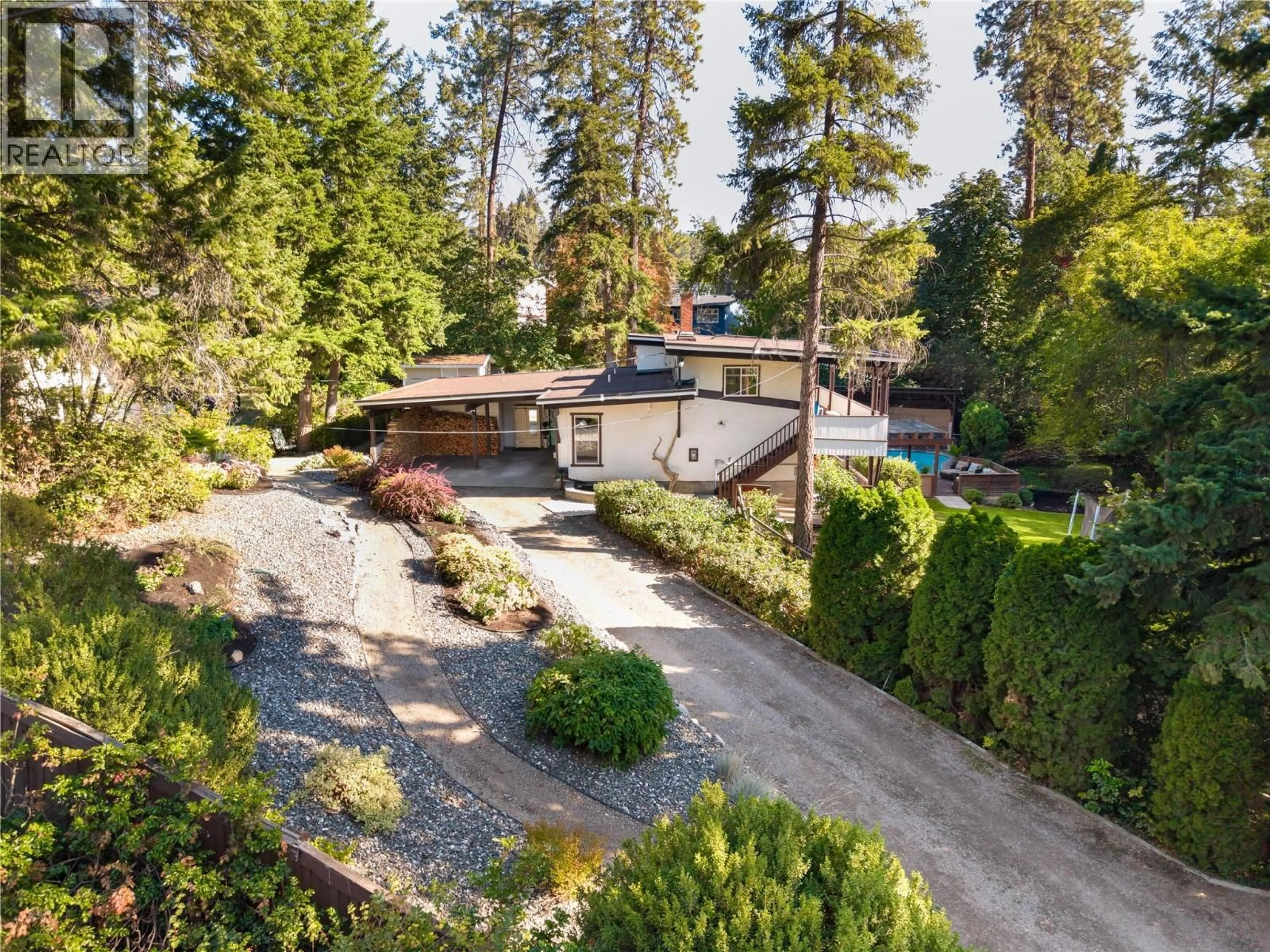 A pic from outside/outdoor area/front of a property/back of a property/a pic from drone, street for 2475 DUNSMUIR ROAD, Kelowna British Columbia V1W2V2