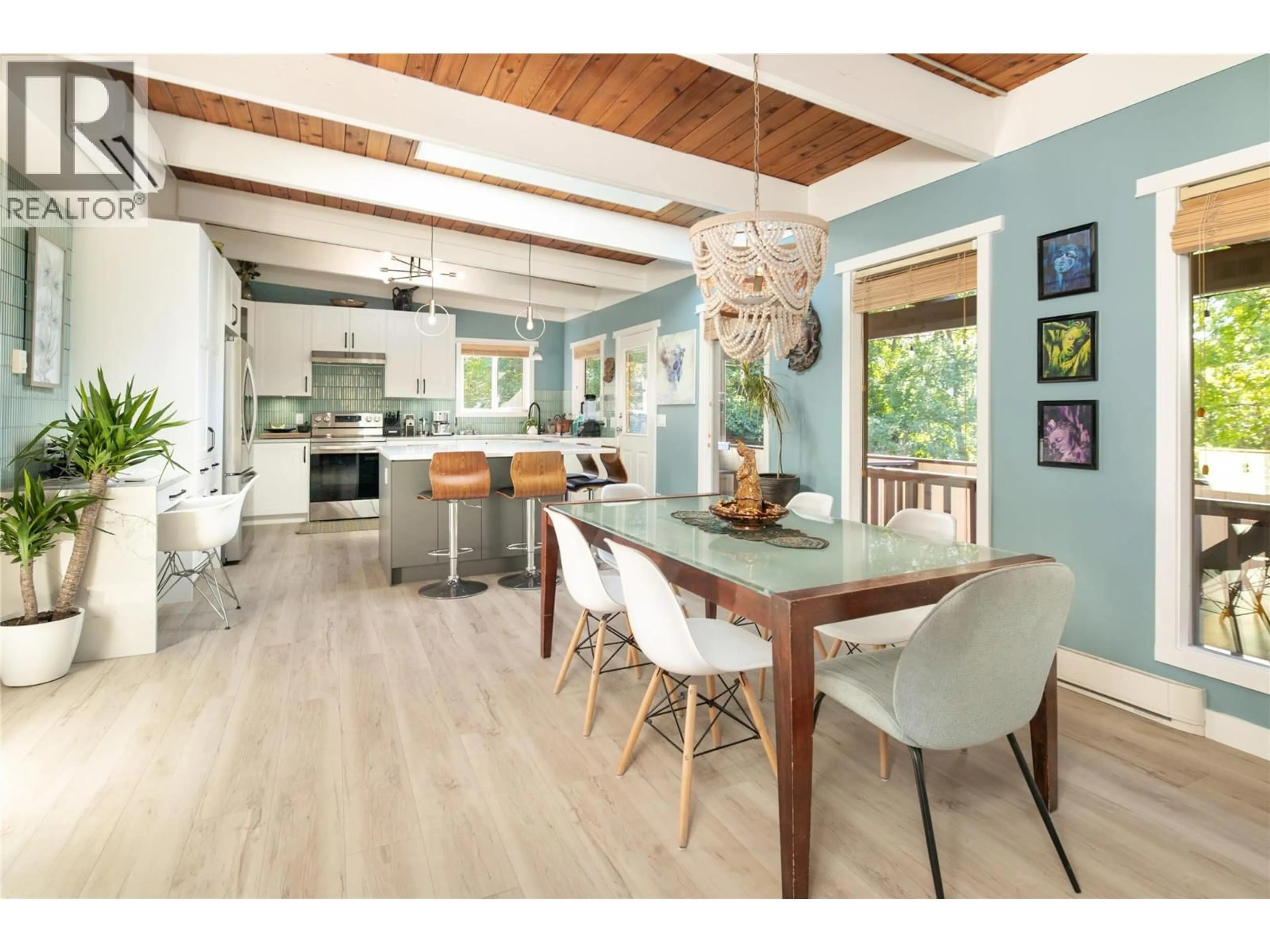 Open concept kitchen, wood/laminate floor for 2475 DUNSMUIR ROAD, Kelowna British Columbia V1W2V2